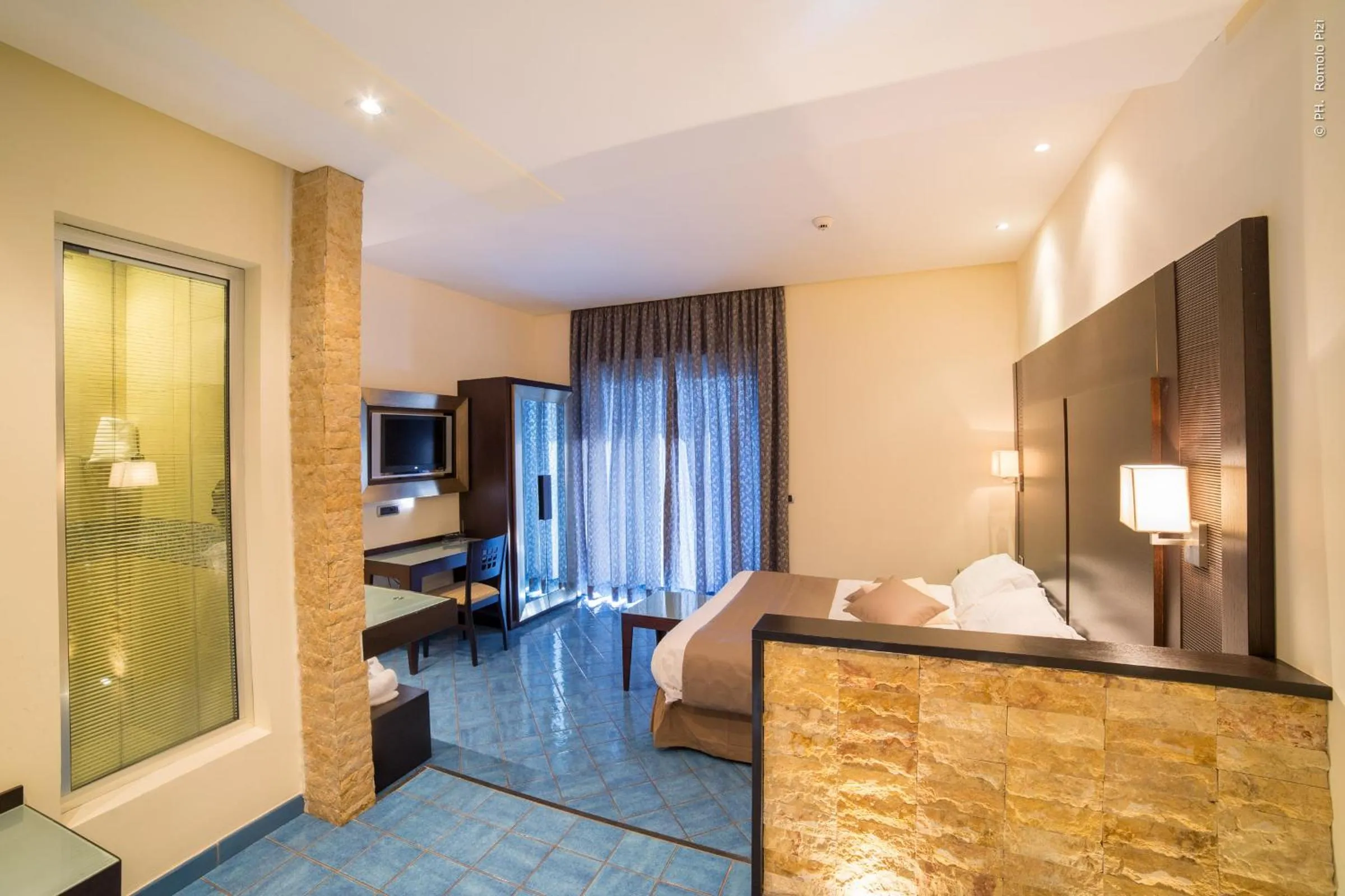 Bed in Hotel La Lucertola