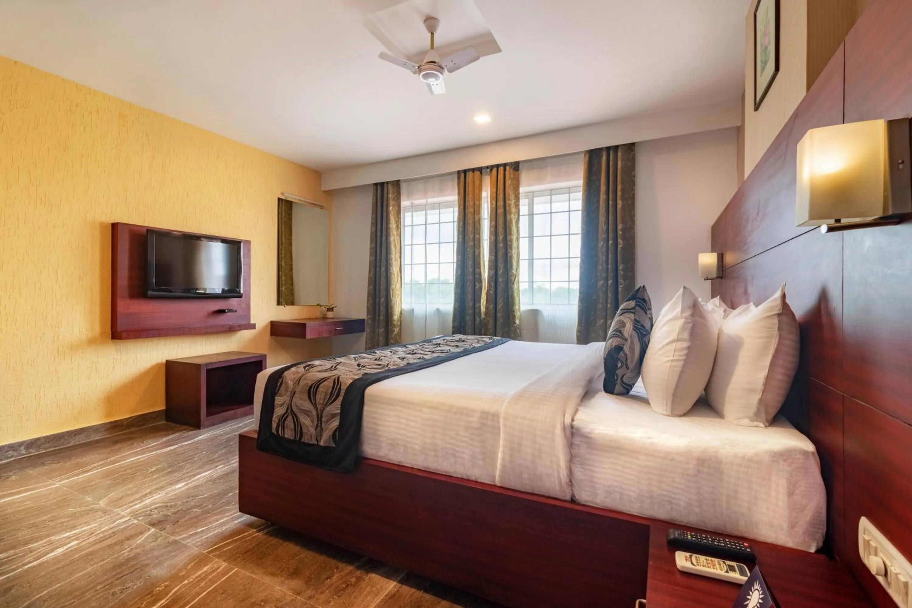 Photo of the whole room, Bed in Zip By Spree Hotels Mangala Towers Thrissur