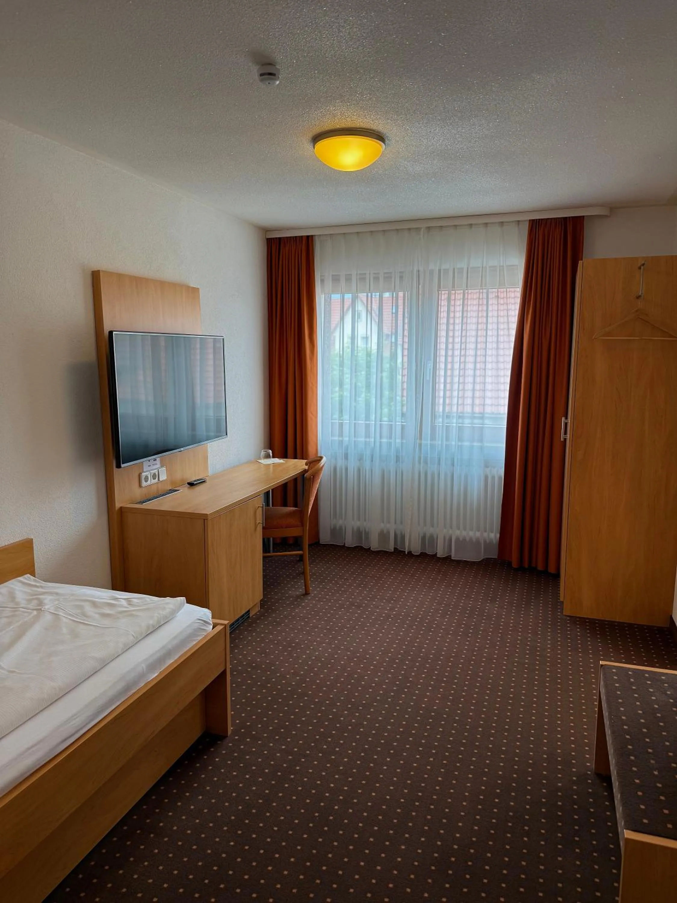 Photo of the whole room, Bed in Gasthof Lamm Grabenstetten