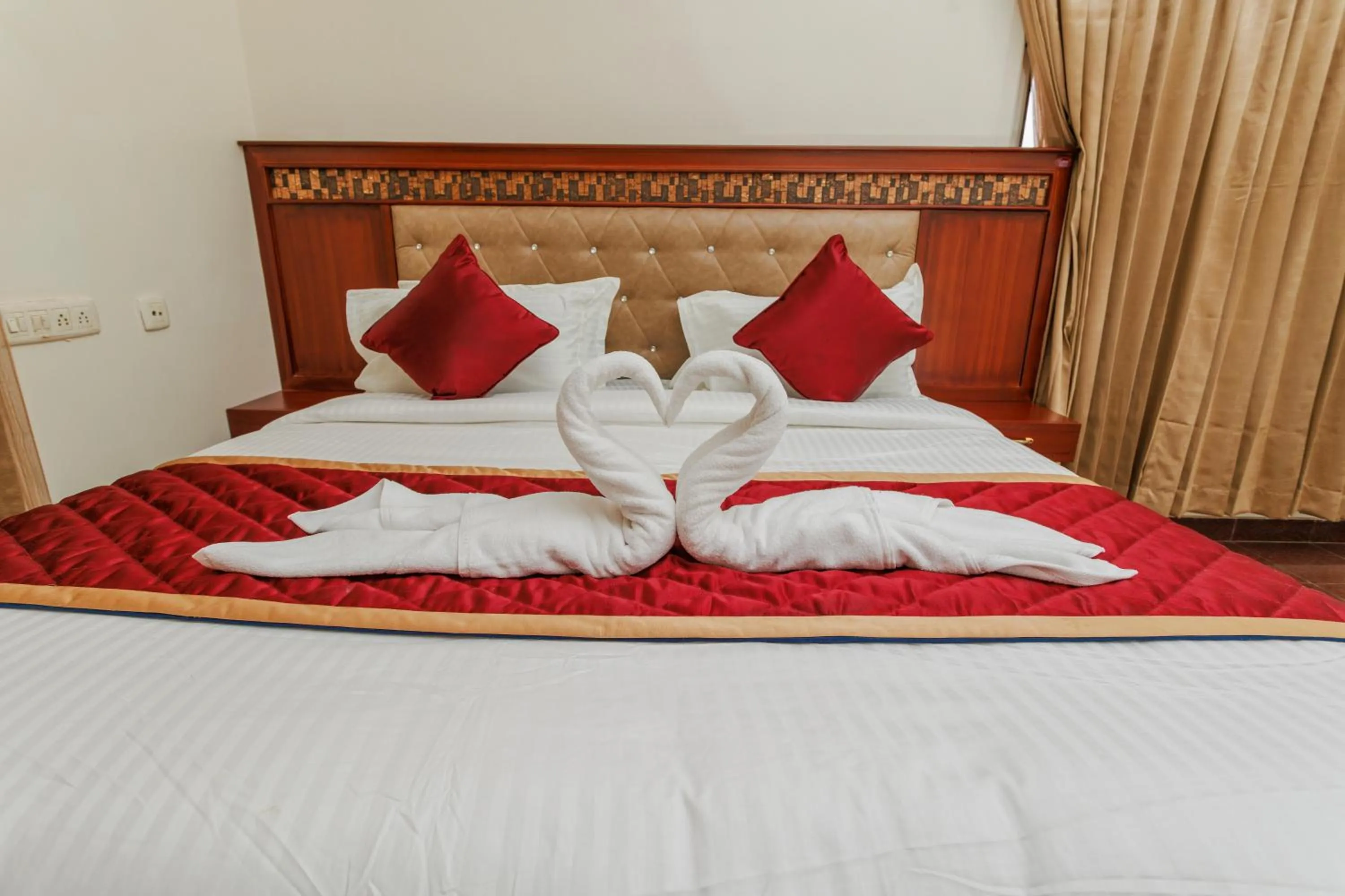 Bed in HOTEL BLUEMOON