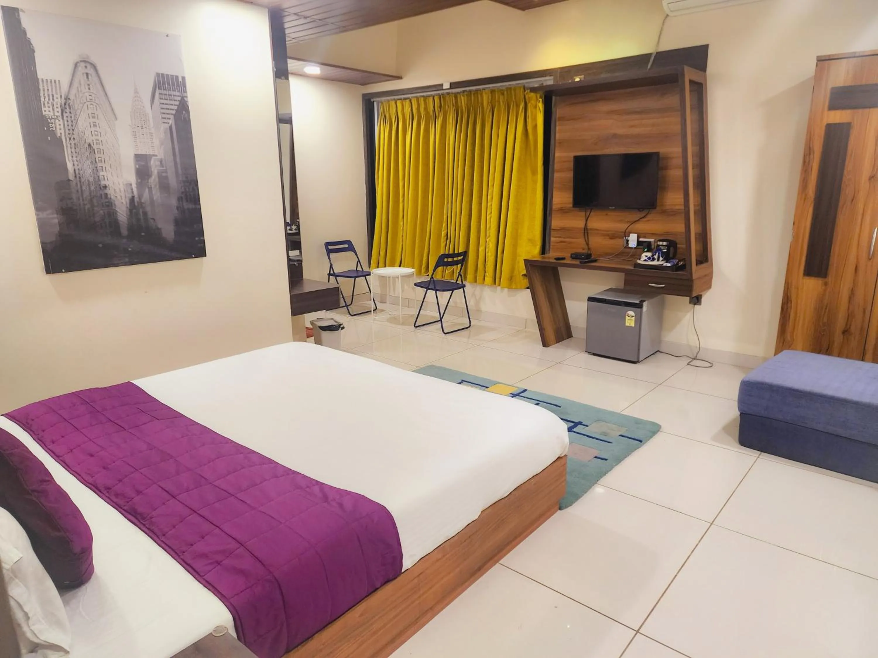 Bed in Passiflora Beach Resort Alibaug