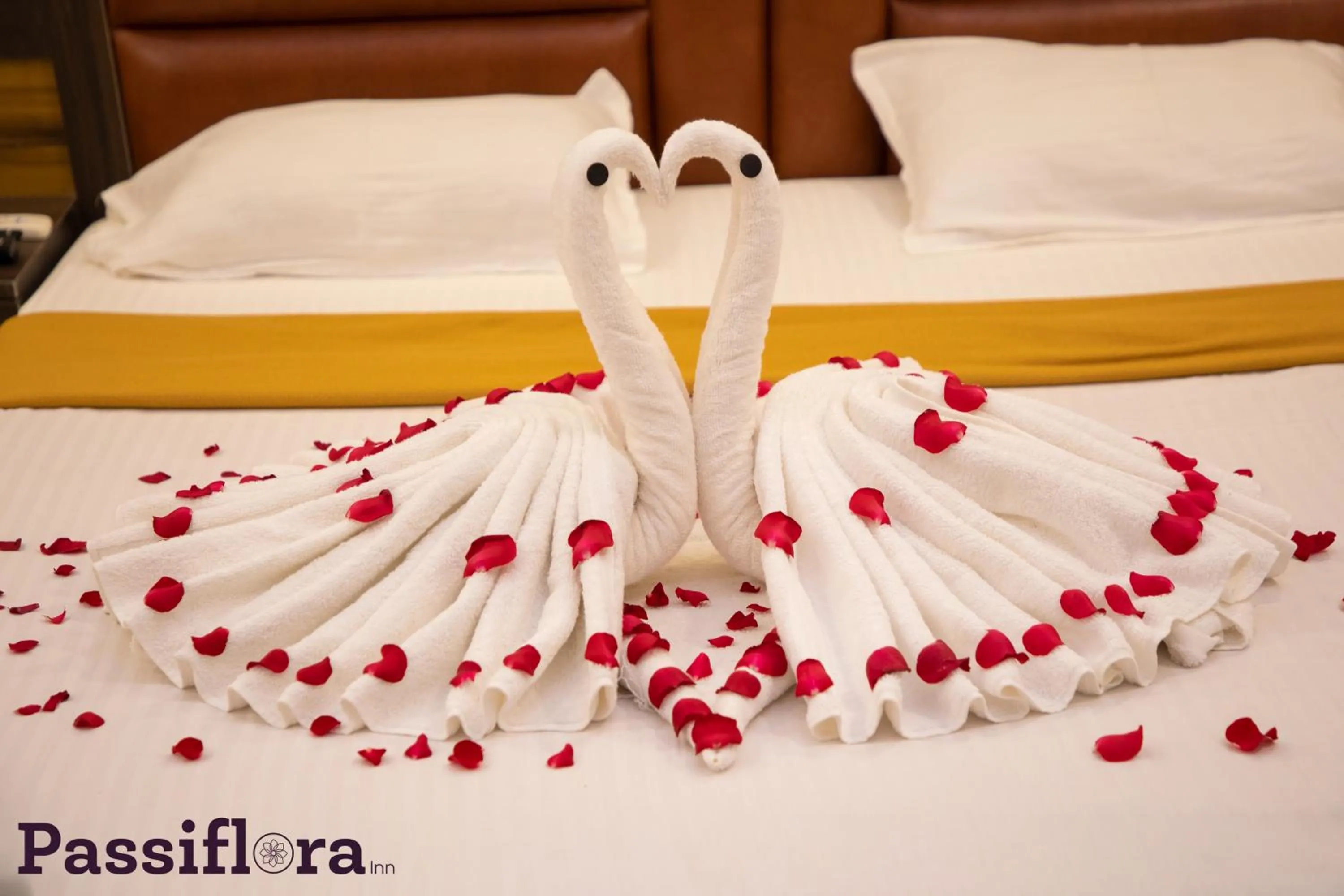 Bed in Passiflora Beach Resort Alibaug