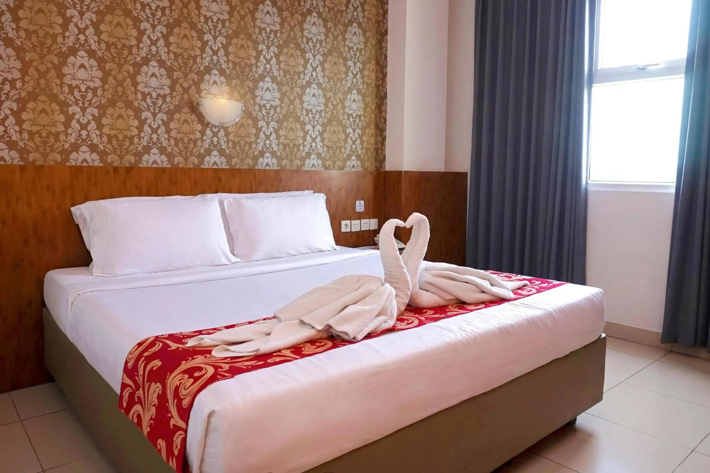 Bed in Marilyn Hotel Serpong