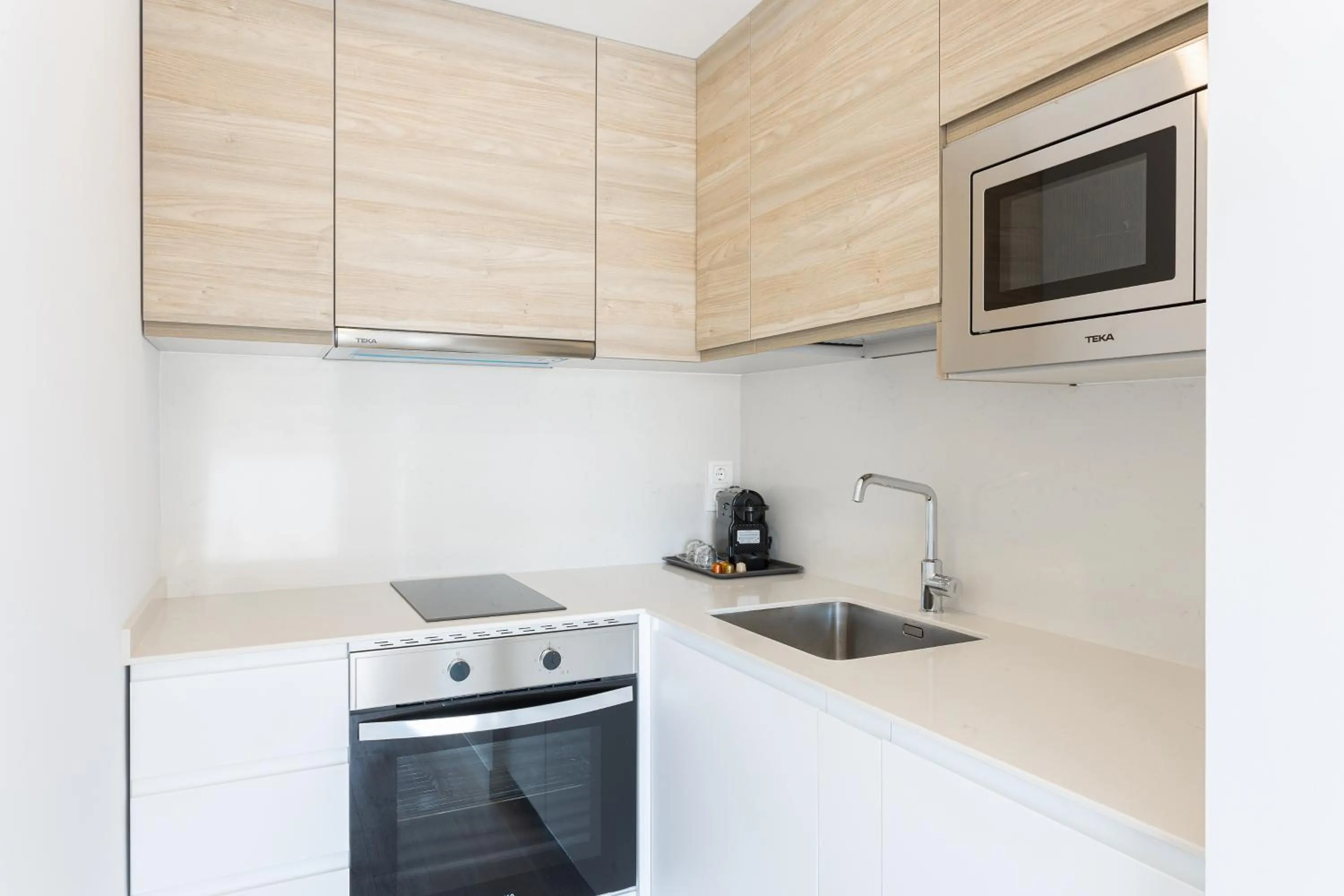 Kitchen or kitchenette in Caleyro Boutique Apartments - "Parking incluido"