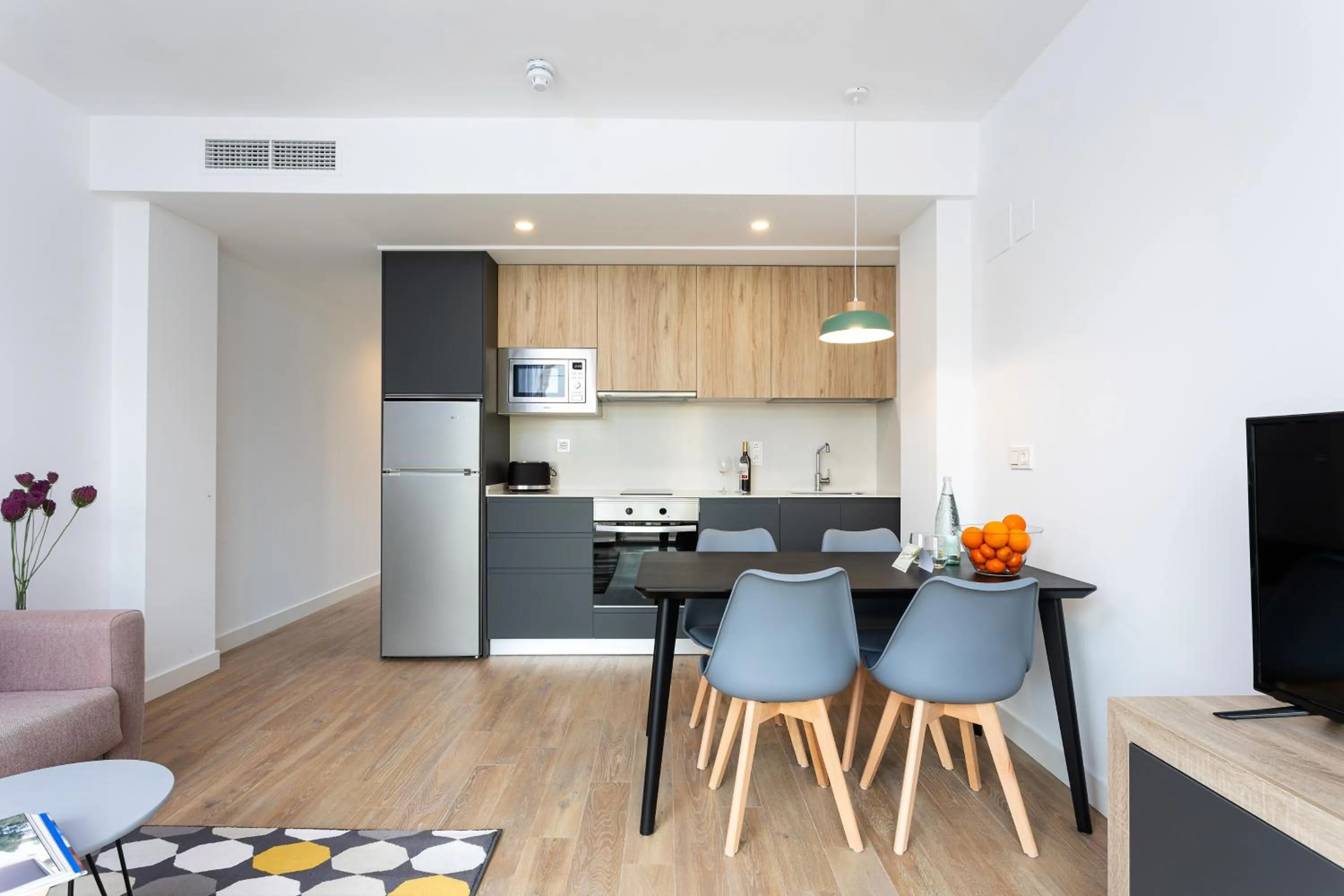 Kitchen or kitchenette in Caleyro Boutique Apartments - "Parking incluido"
