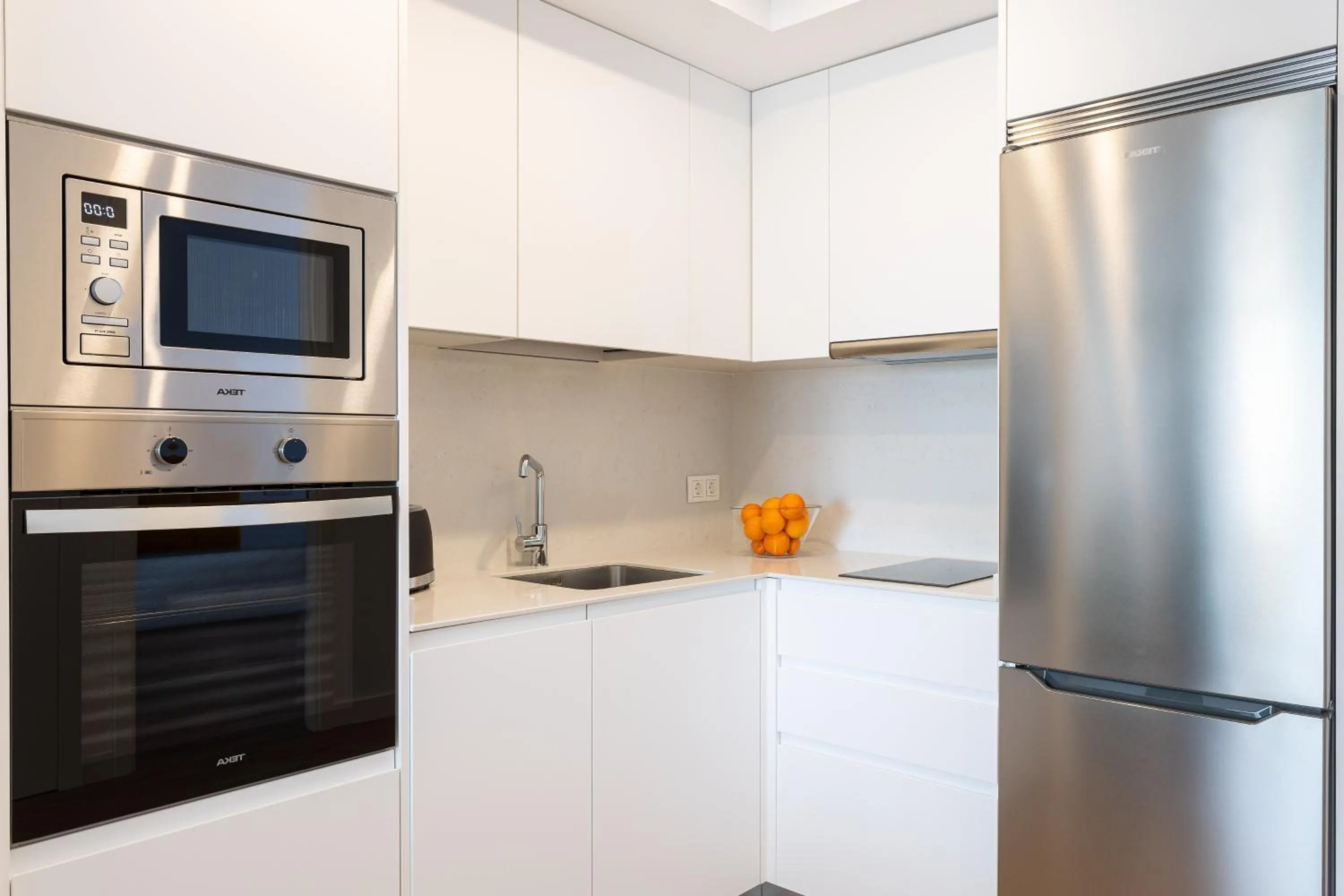 Kitchen or kitchenette in Caleyro Boutique Apartments - "Parking incluido"