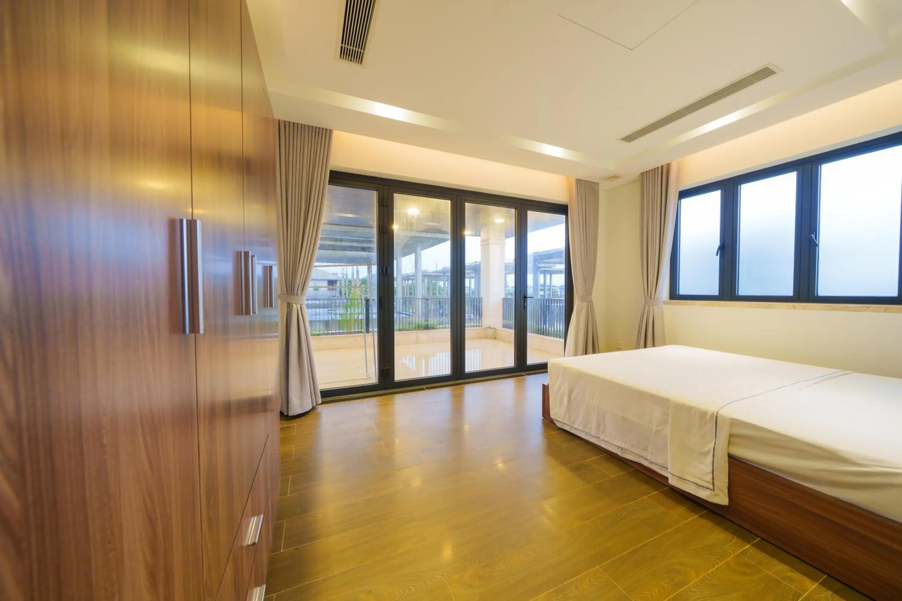 Balcony/Terrace, Bed in Cami Riverside Resort Da Nang