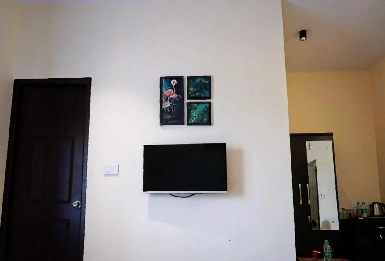 TV and multimedia in Coastal Pearl Home Stay, Private Rooms & Villas Murudeshwar