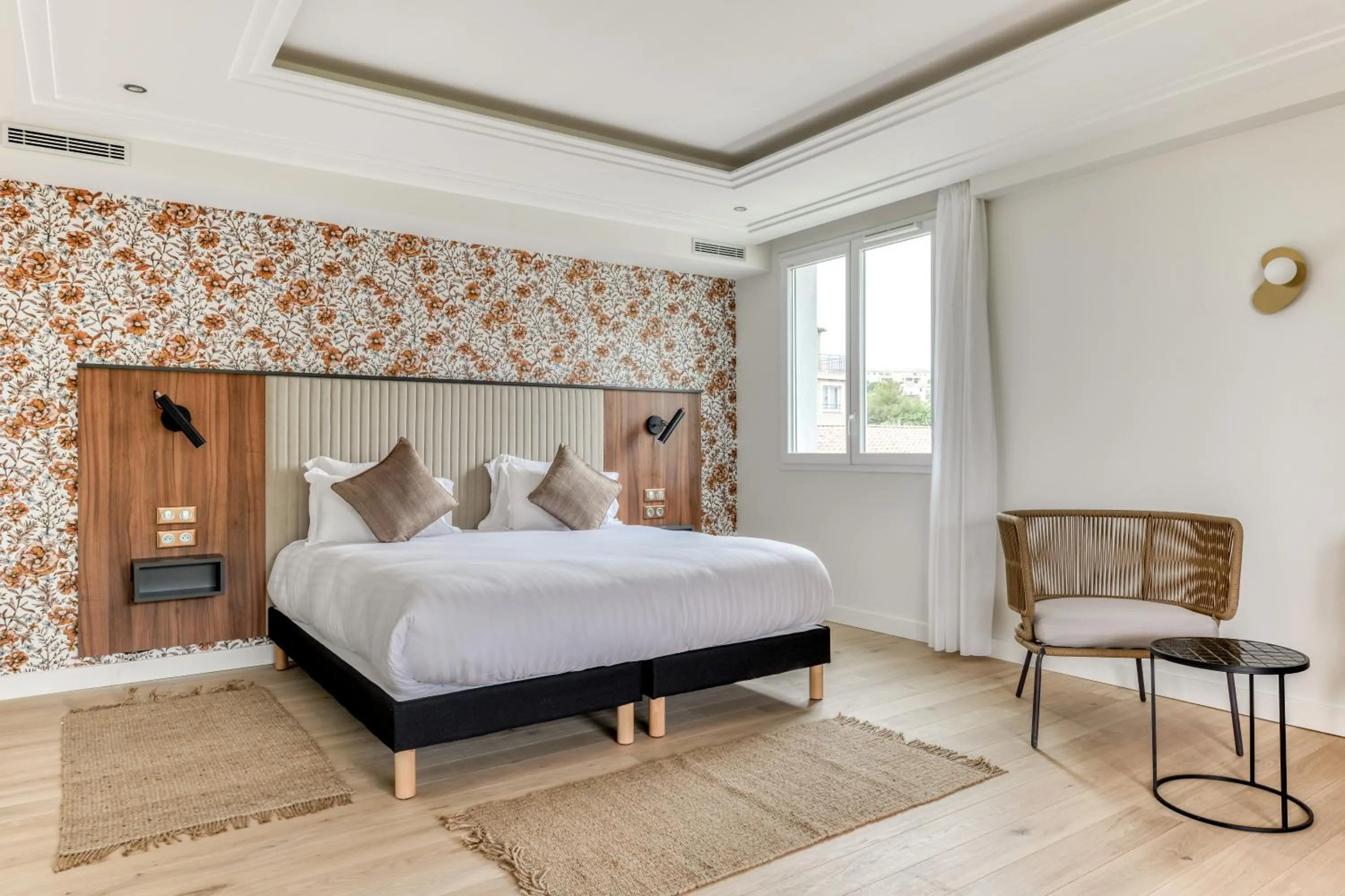 Bed in Zenitude Hotel La Valadière, Ascend Hotel Collection