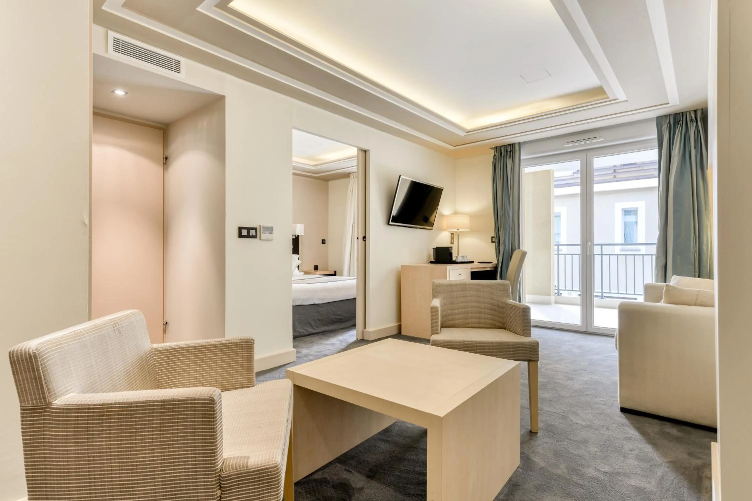 Seating area in Zenitude Hotel La Valadière, Ascend Hotel Collection