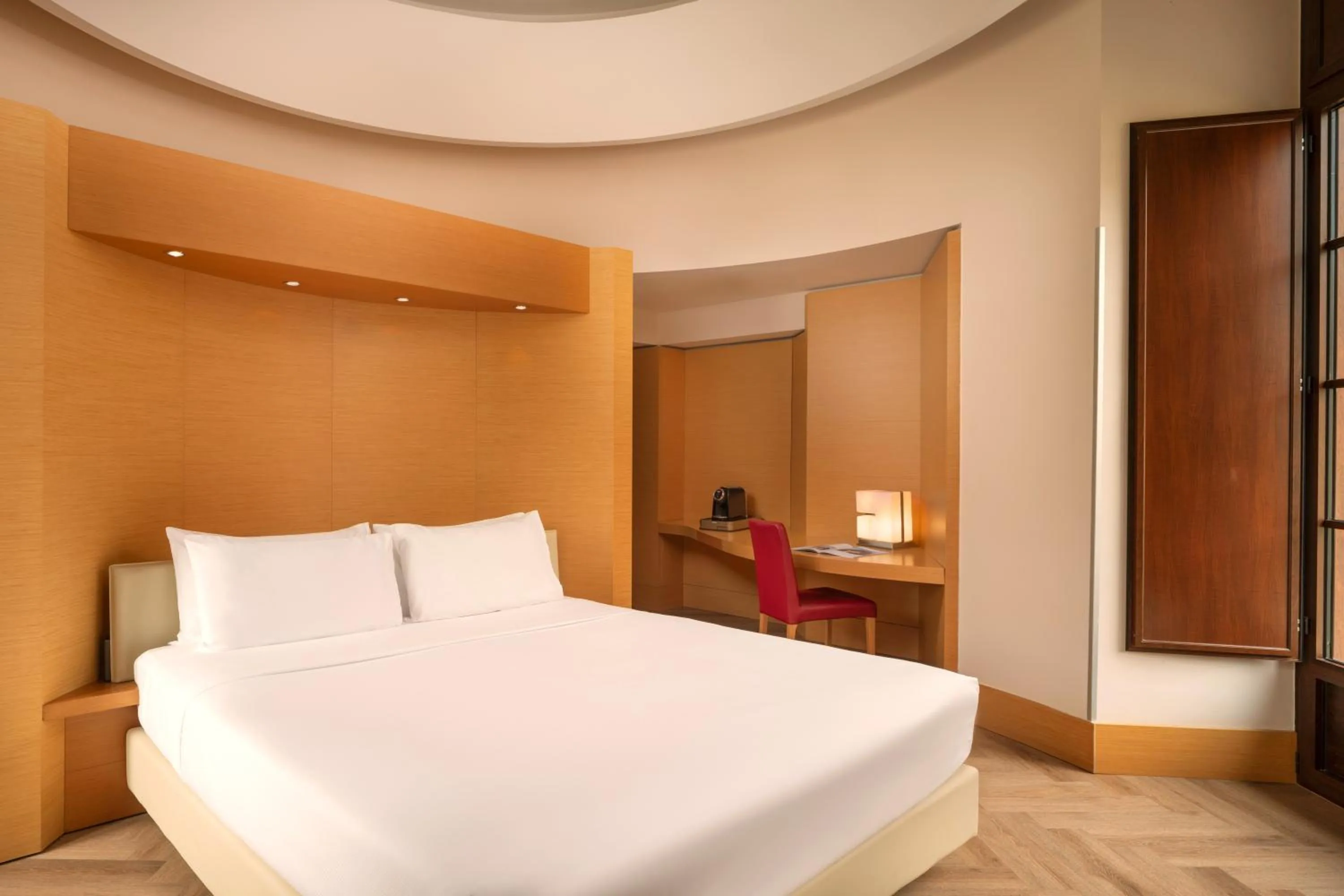 Bed in UNA Hotels Napoli