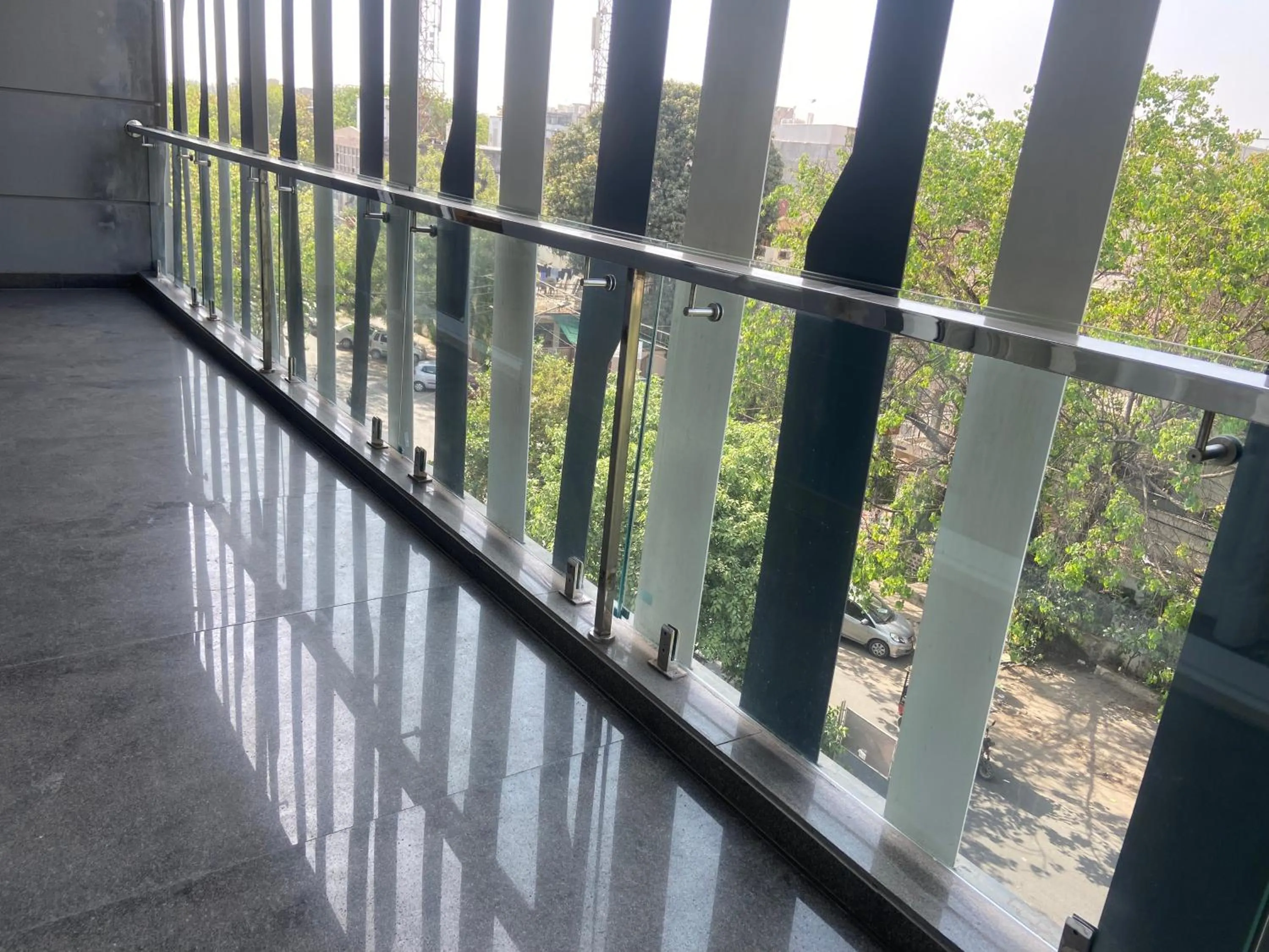 Balcony/Terrace in Hotel Malbork Inn Rajouri Garden Delhi - Couple Friendly Local IDs Accepted