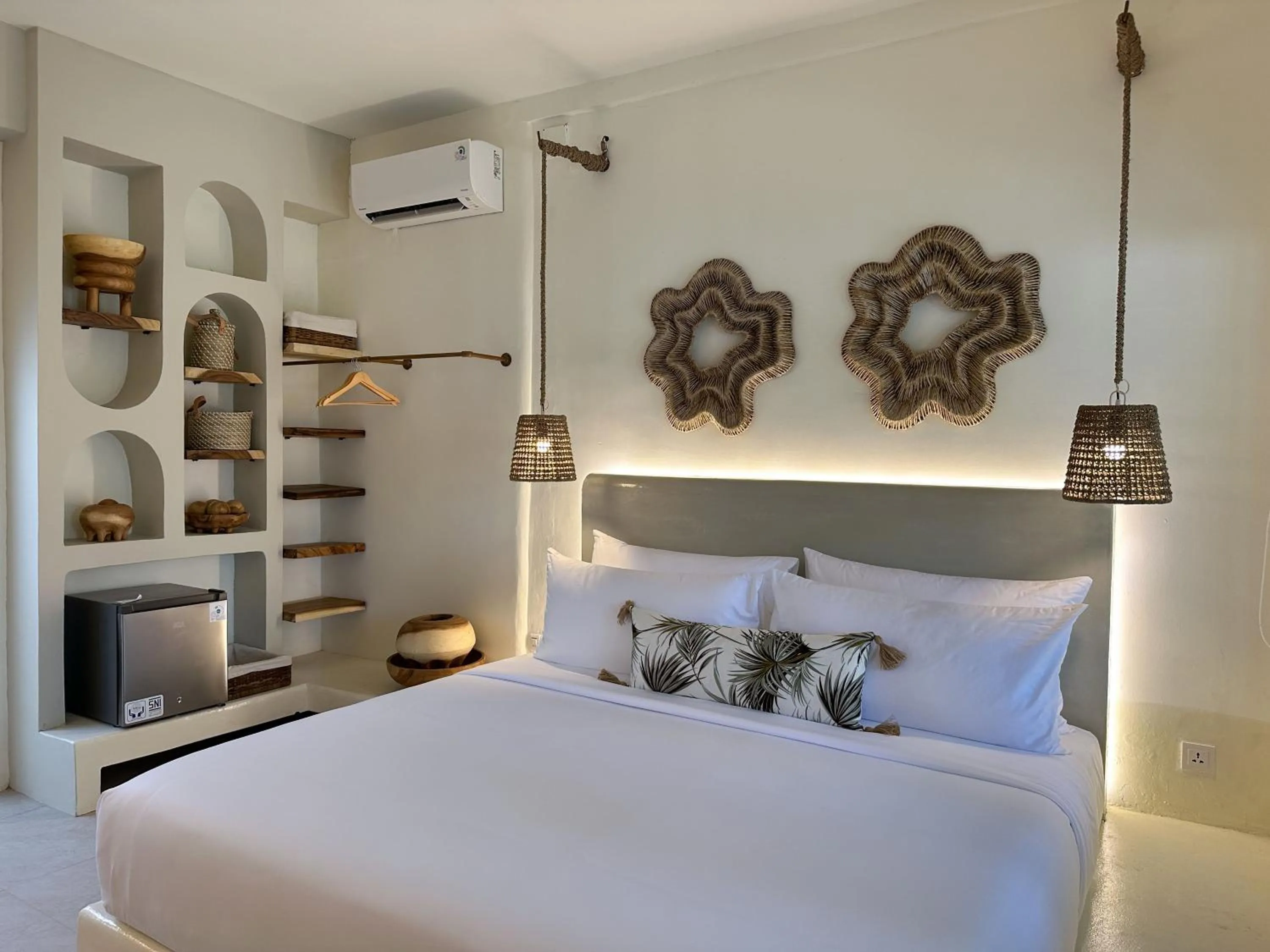 Bed in El Tropico Boutique Hotel