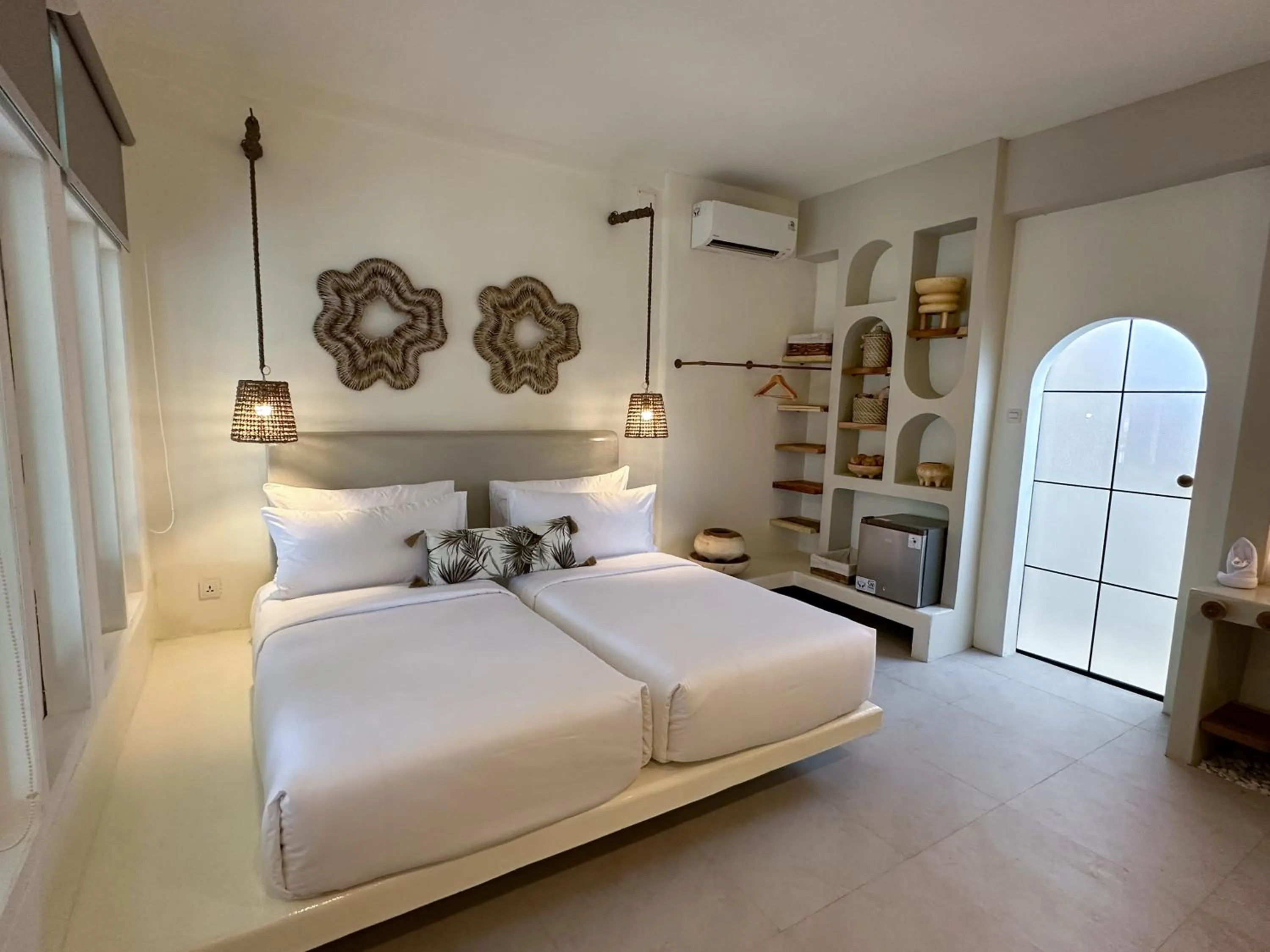 Bed in El Tropico Boutique Hotel