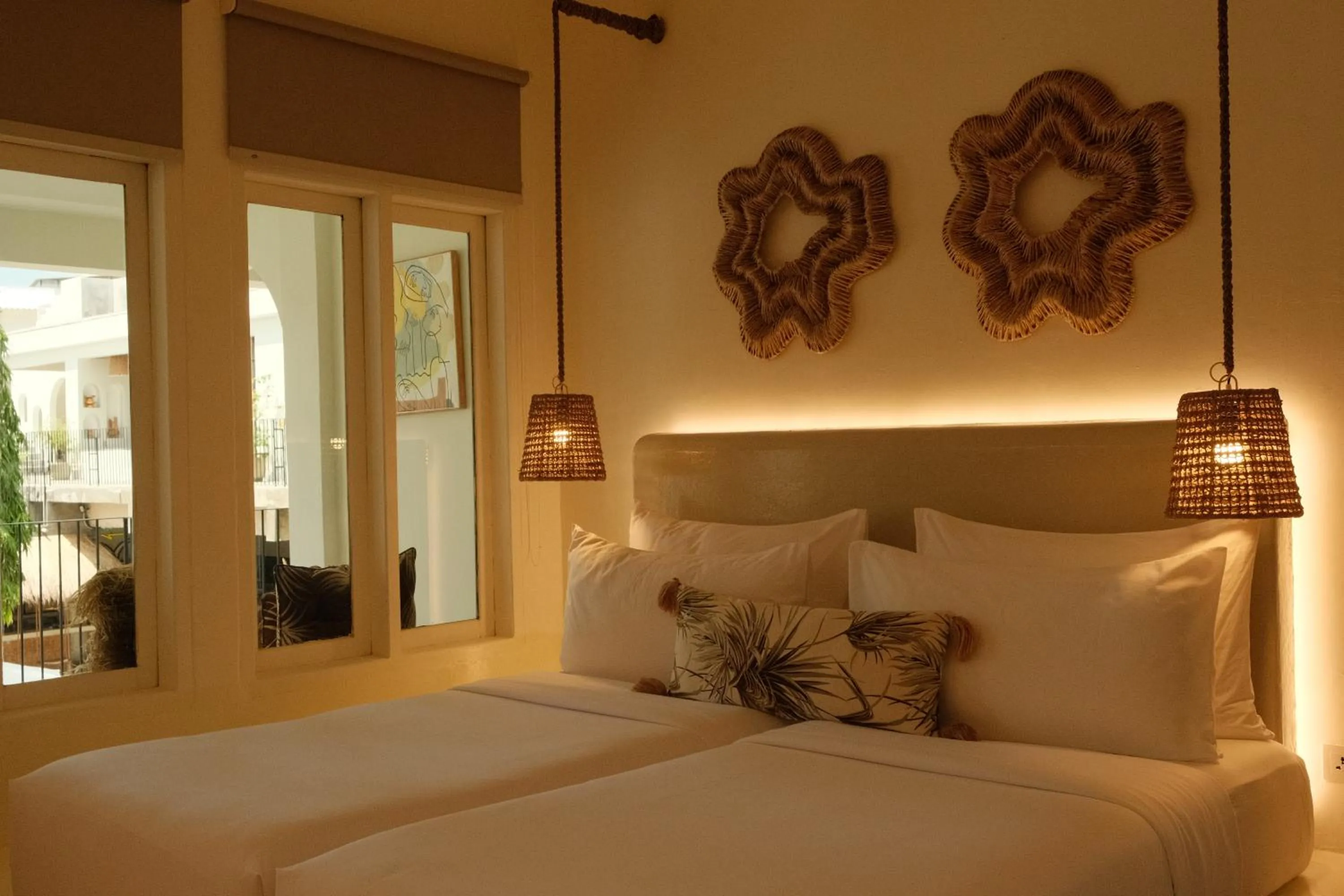 Bed in El Tropico Boutique Hotel