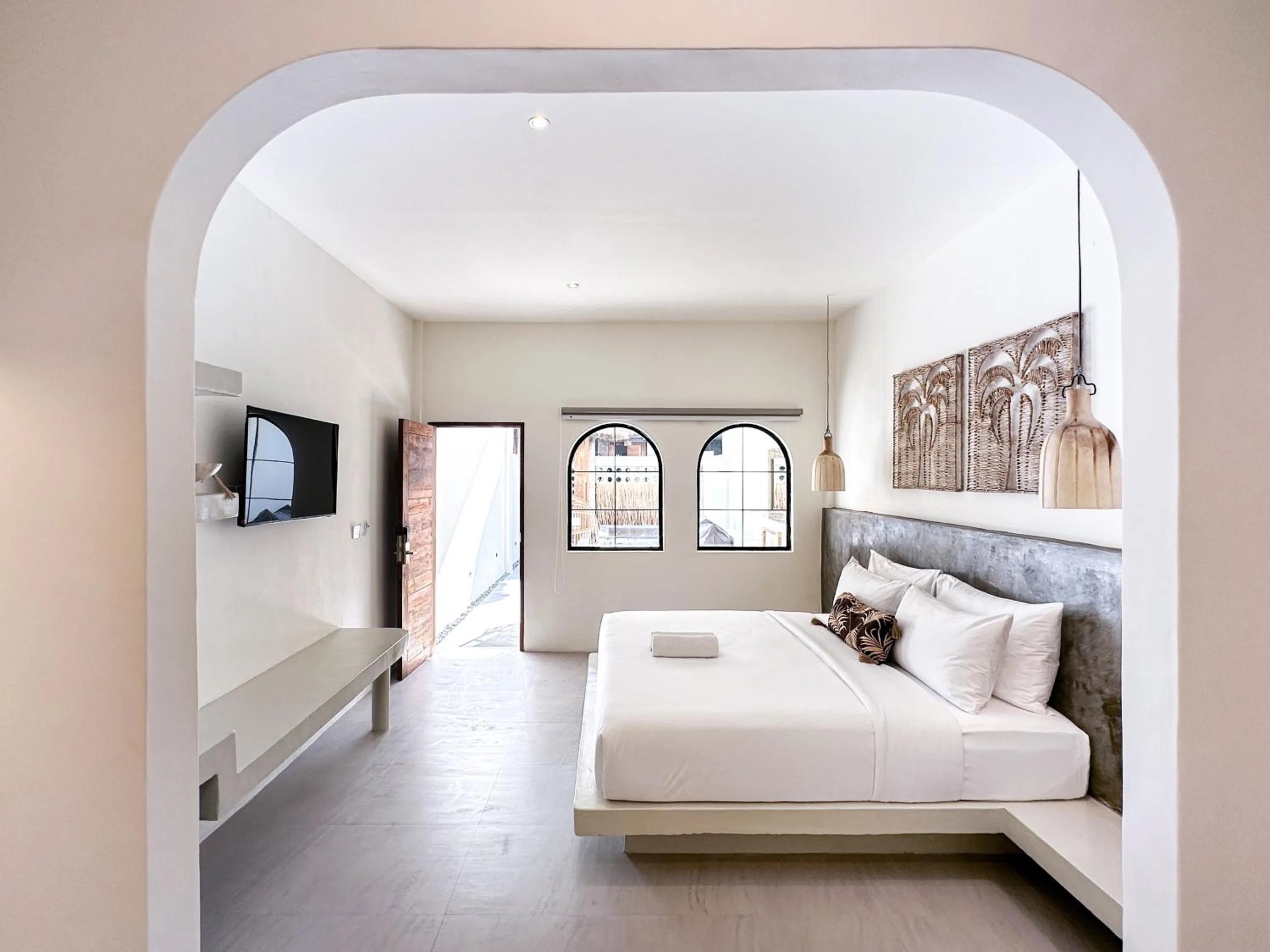 Bed in El Tropico Boutique Hotel