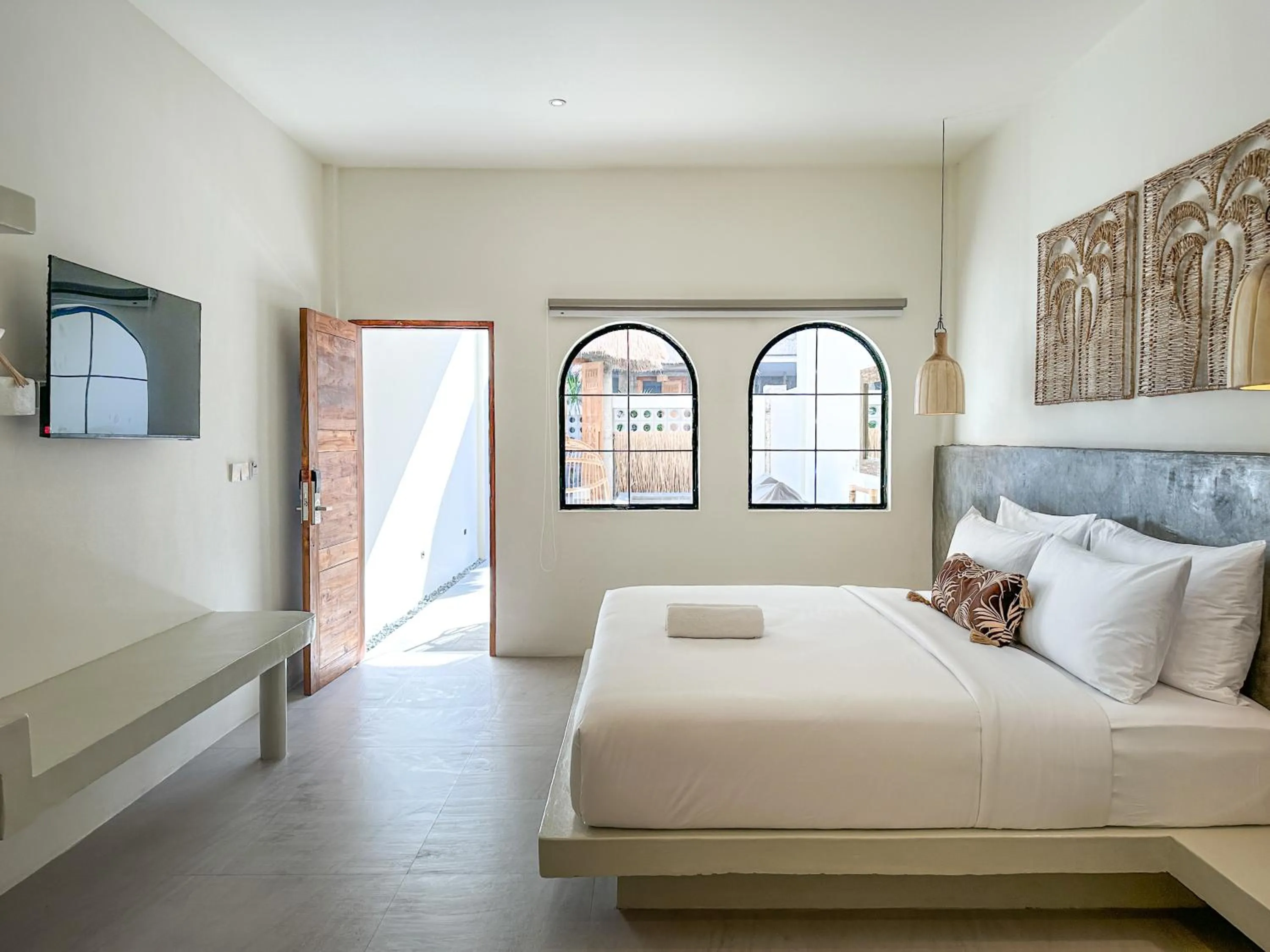 Bed in El Tropico Boutique Hotel