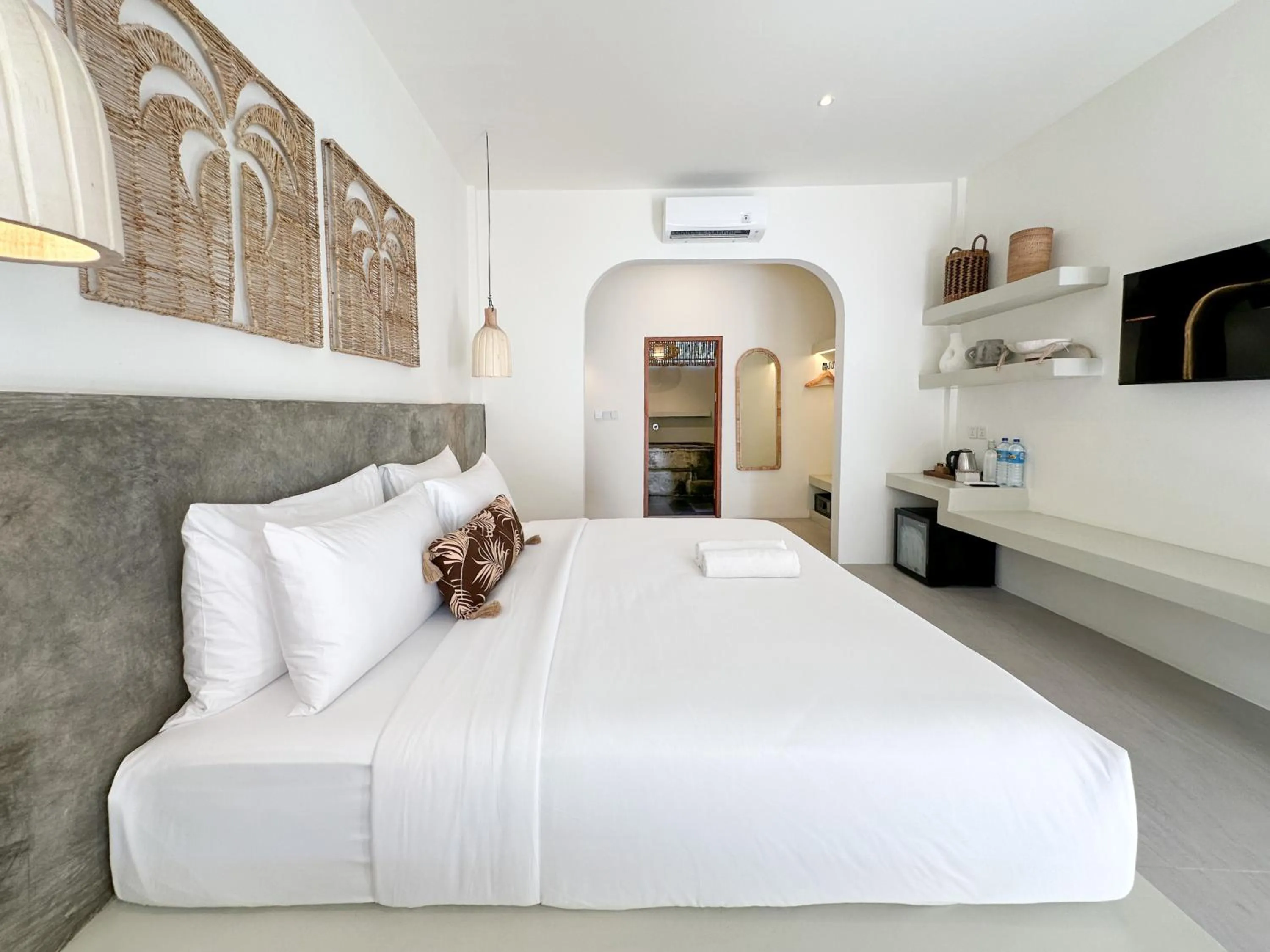 Bed in El Tropico Boutique Hotel