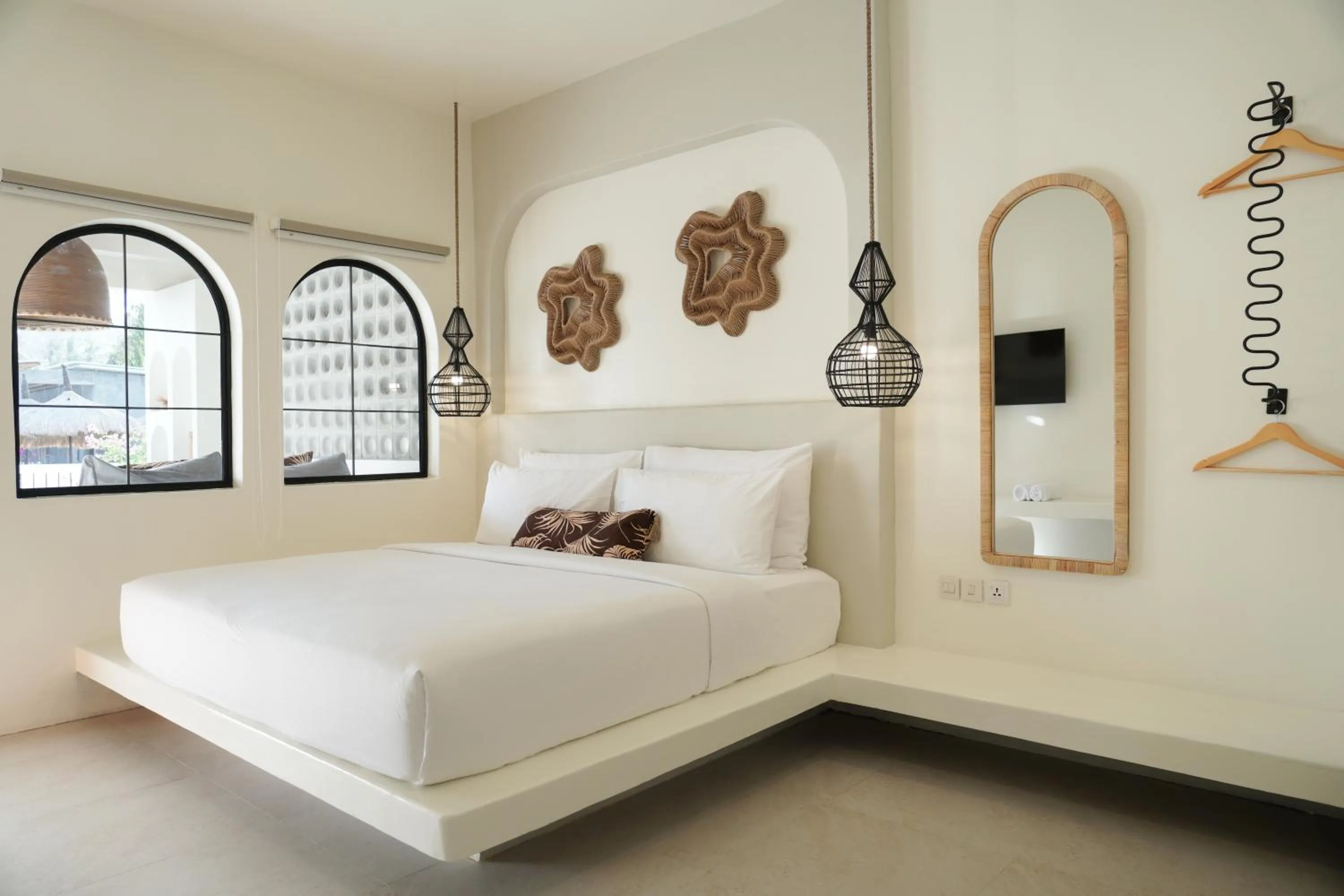 Bed in El Tropico Boutique Hotel