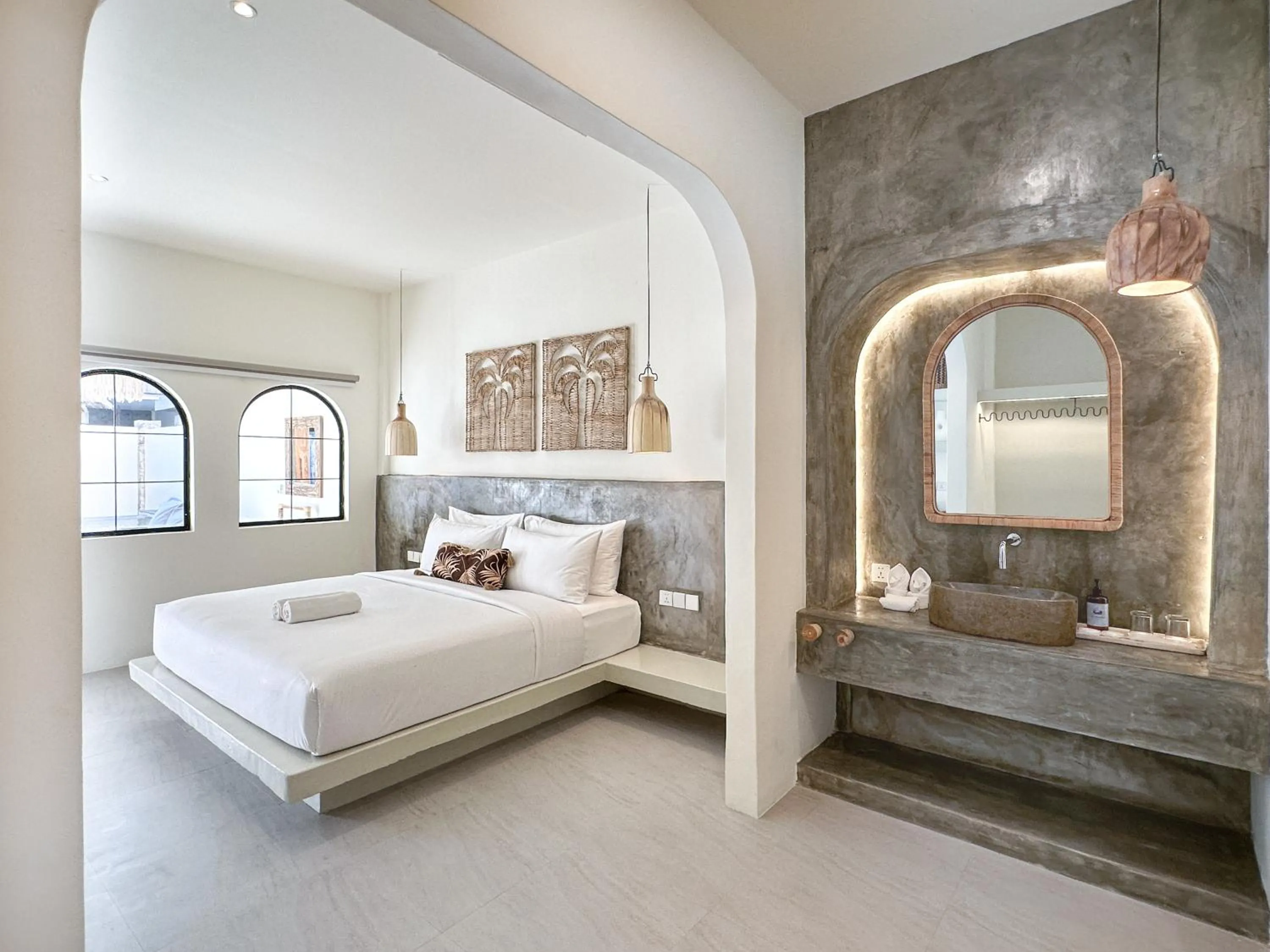 Bed in El Tropico Boutique Hotel