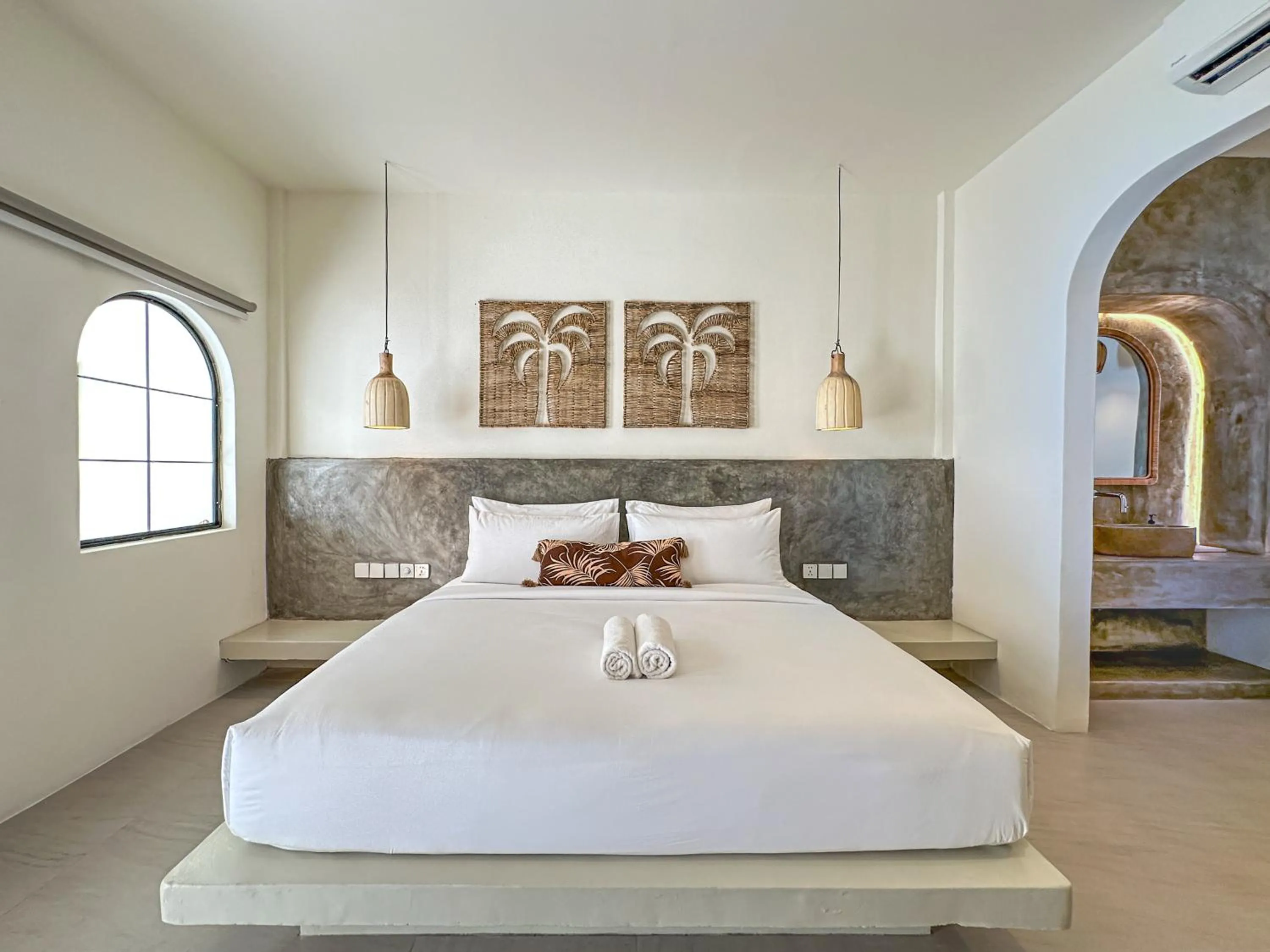 Bed in El Tropico Boutique Hotel