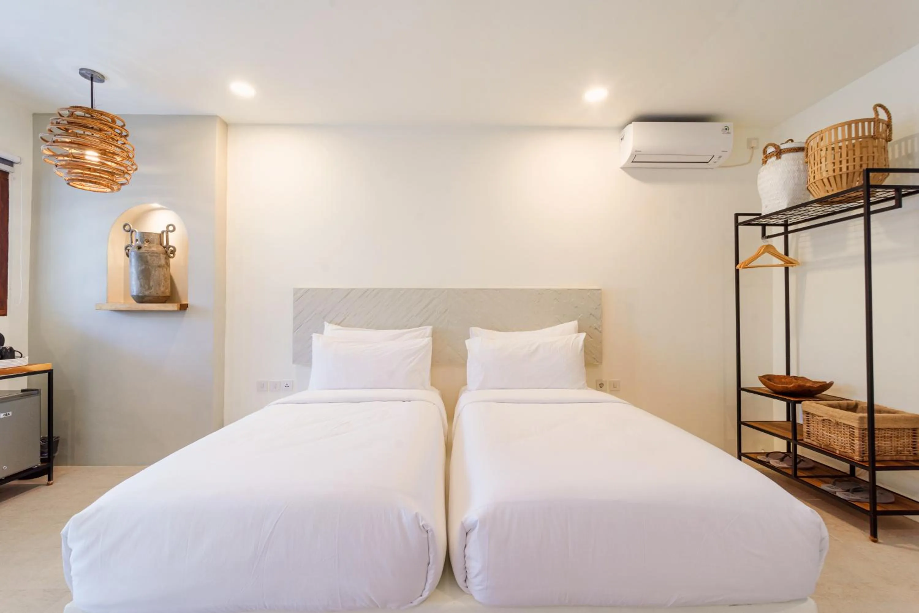 Bed in El Tropico Boutique Hotel