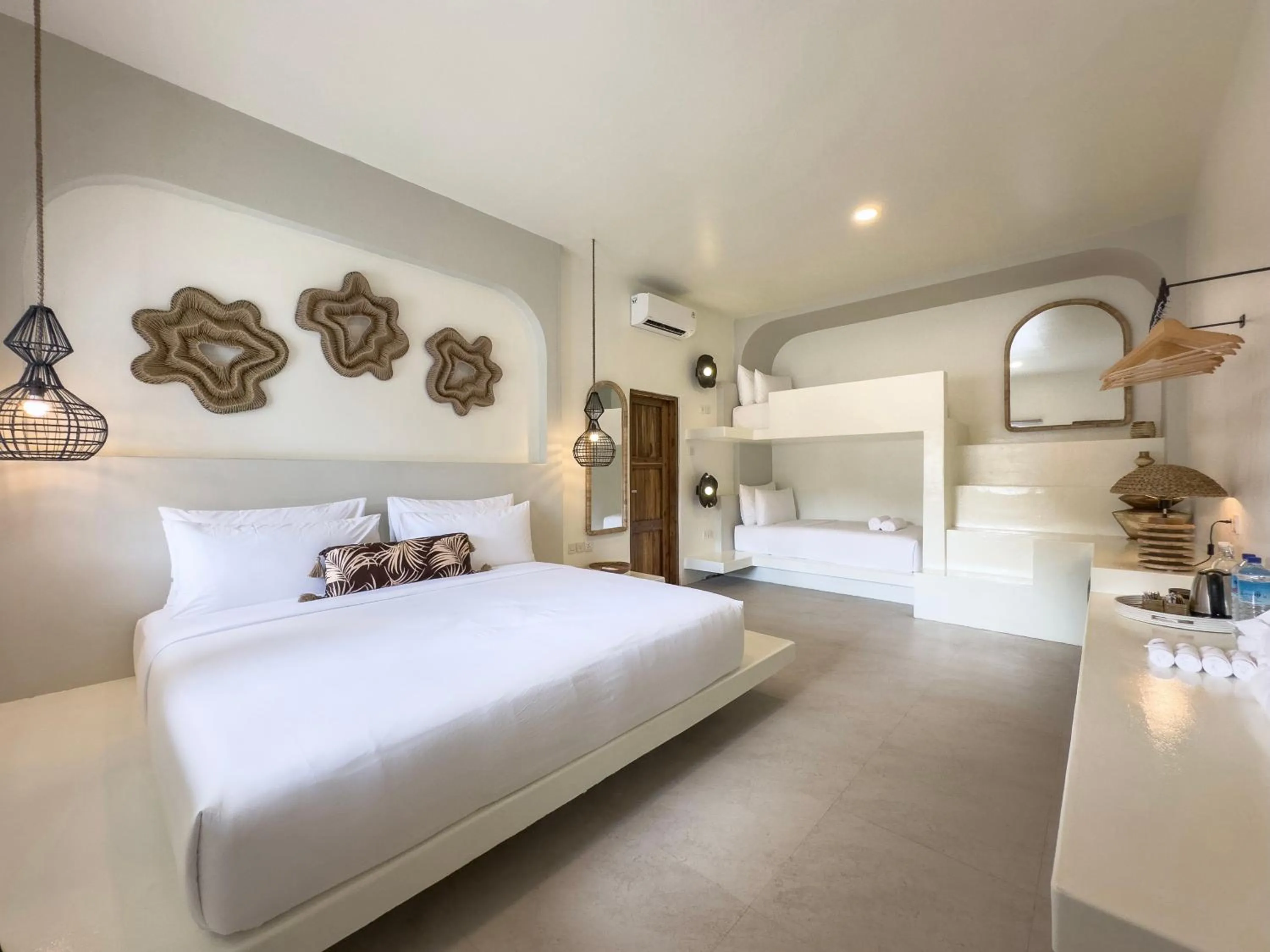 Bed in El Tropico Boutique Hotel