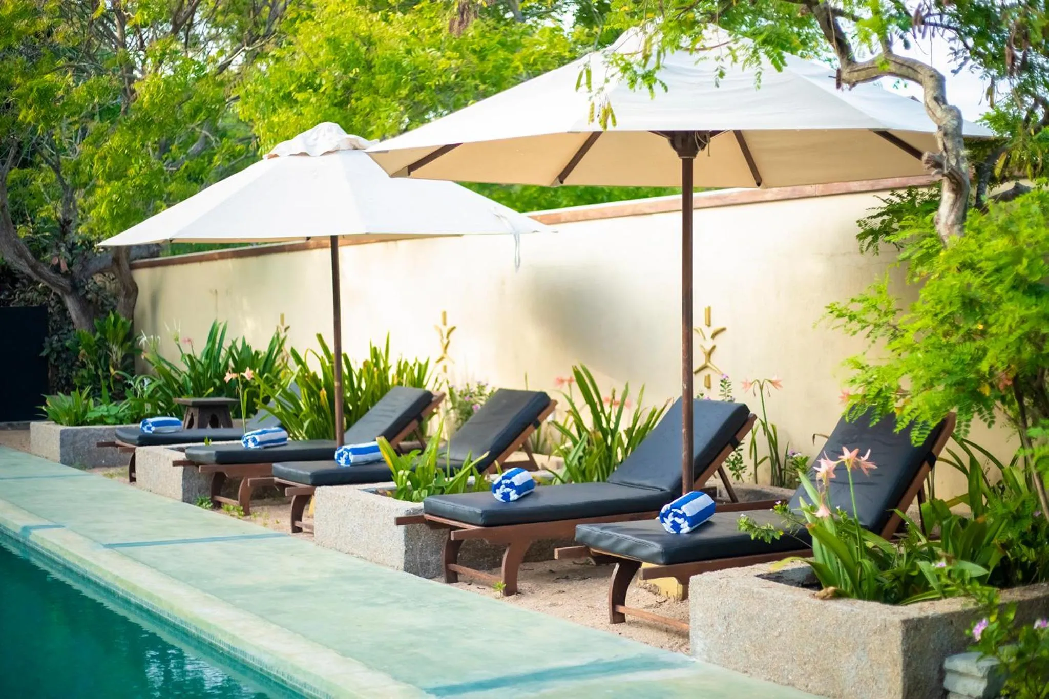 sunbed in NIKARA Luxury Beach House