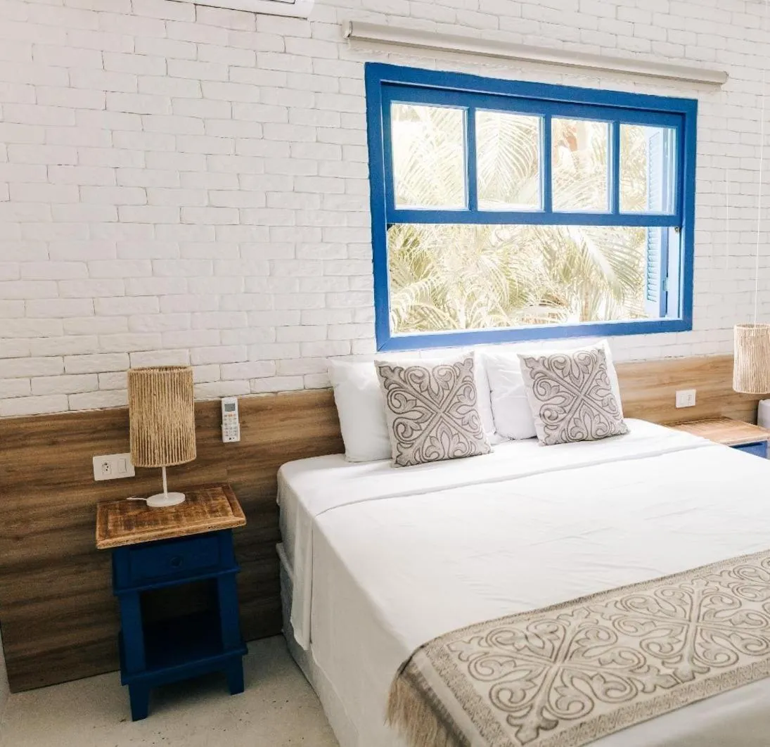 Bed in Pousada Villa Santô