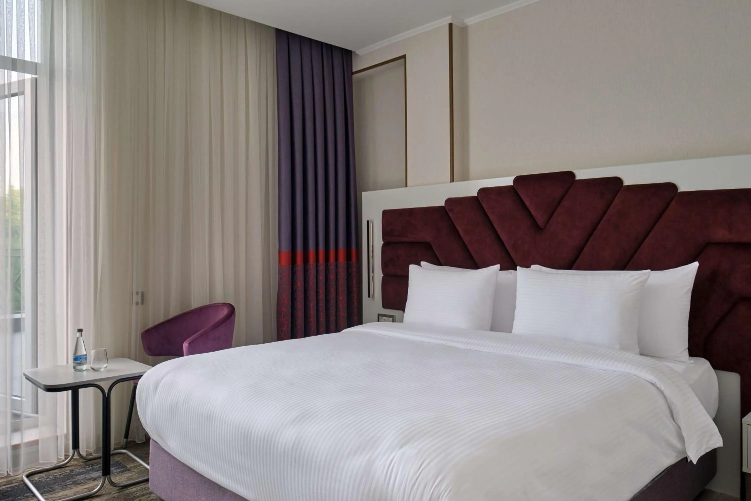 Bedroom, Bed in Panarams Tashkent Hotel, a member of Radisson Individuals