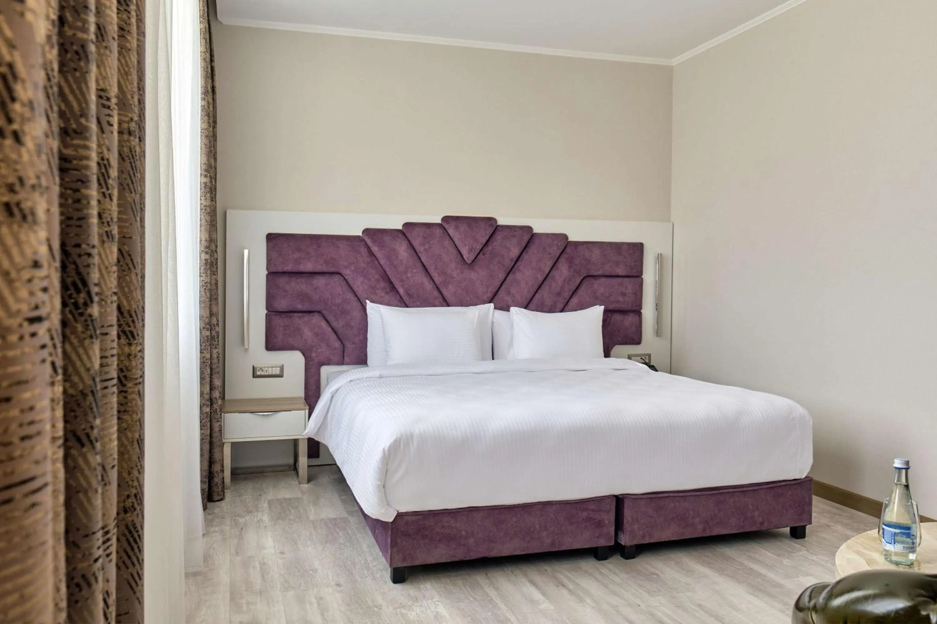 Bedroom, Bed in Panarams Tashkent Hotel, a member of Radisson Individuals