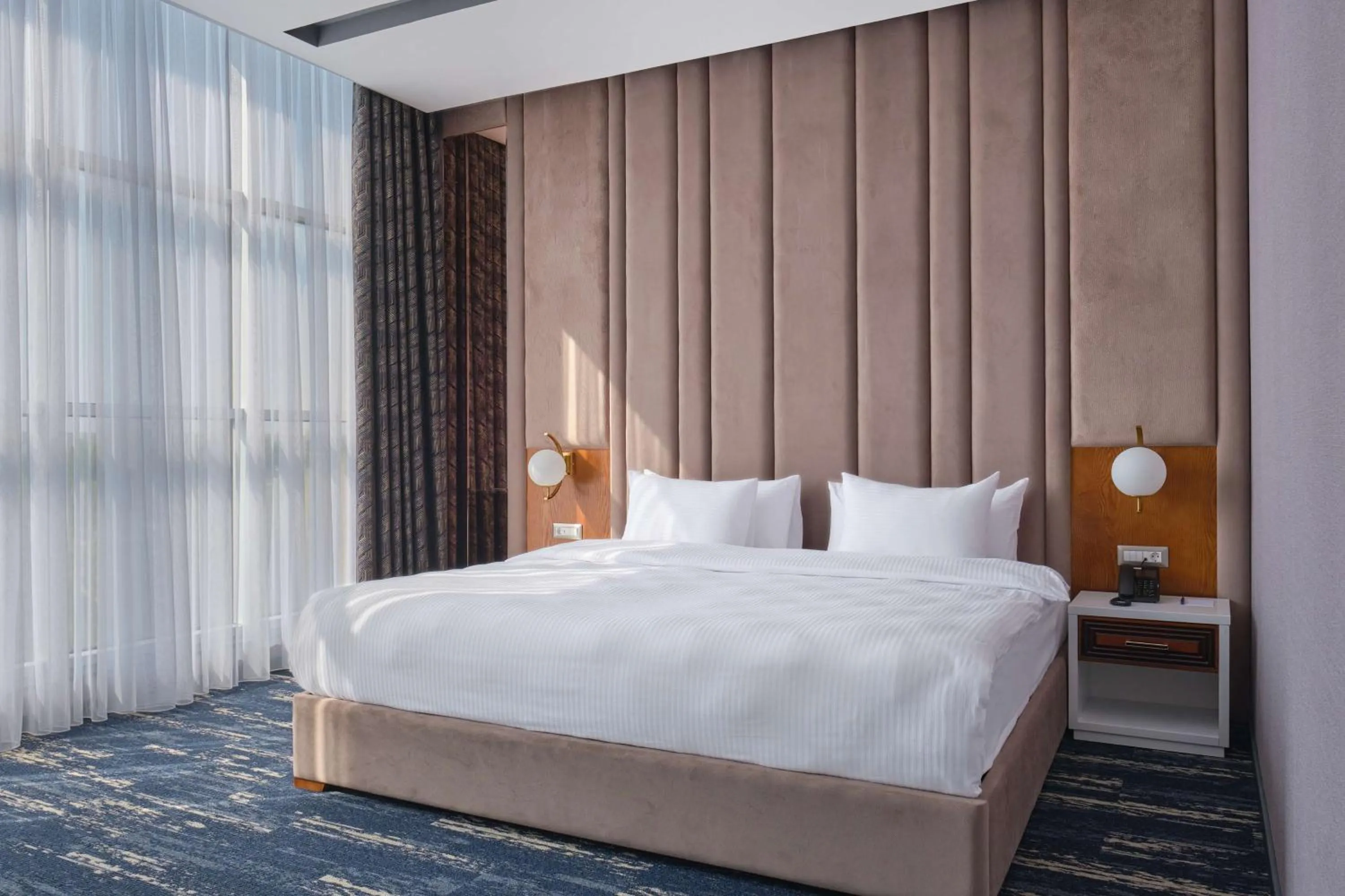 Photo of the whole room, Bed in Panarams Tashkent Hotel, a member of Radisson Individuals