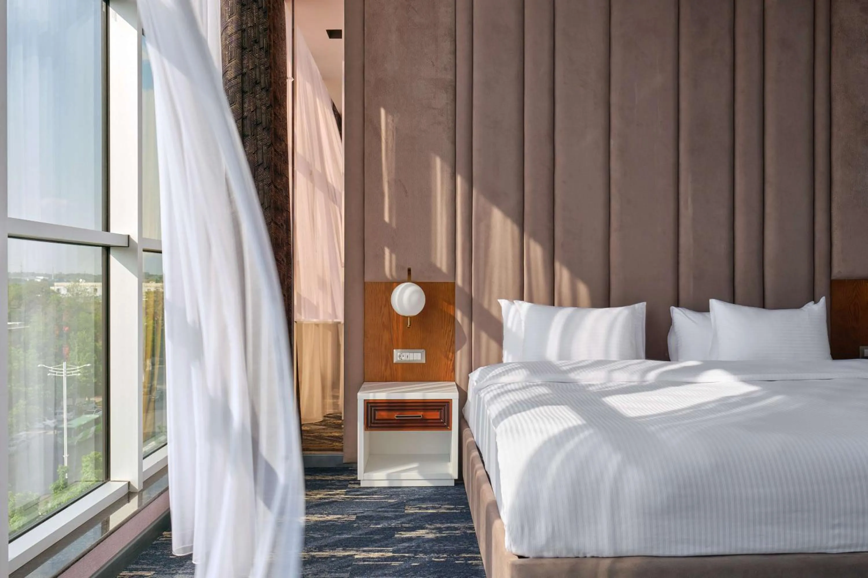 Photo of the whole room, Bed in Panarams Tashkent Hotel, a member of Radisson Individuals