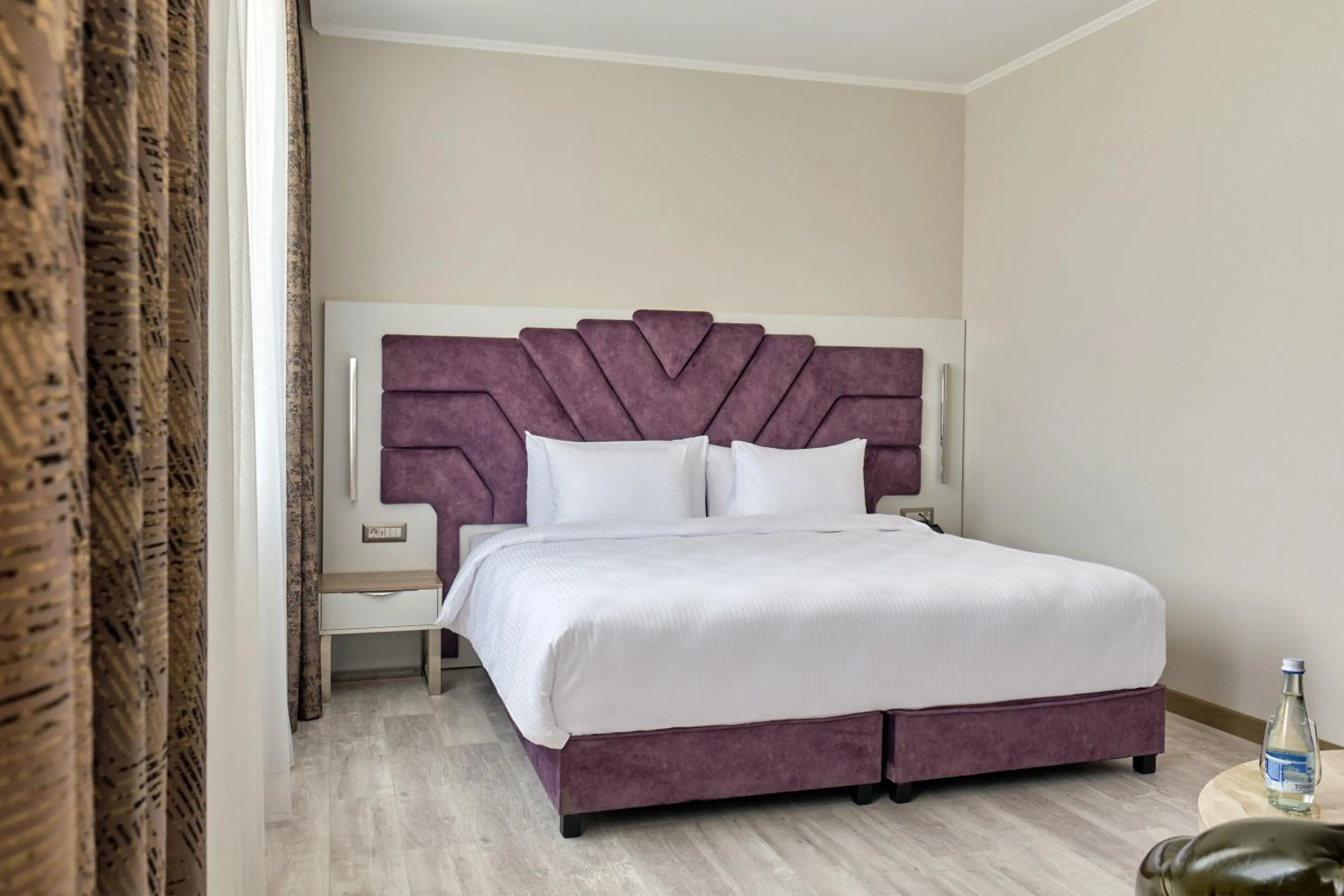 Bedroom, Bed in Panarams Tashkent Hotel, a member of Radisson Individuals