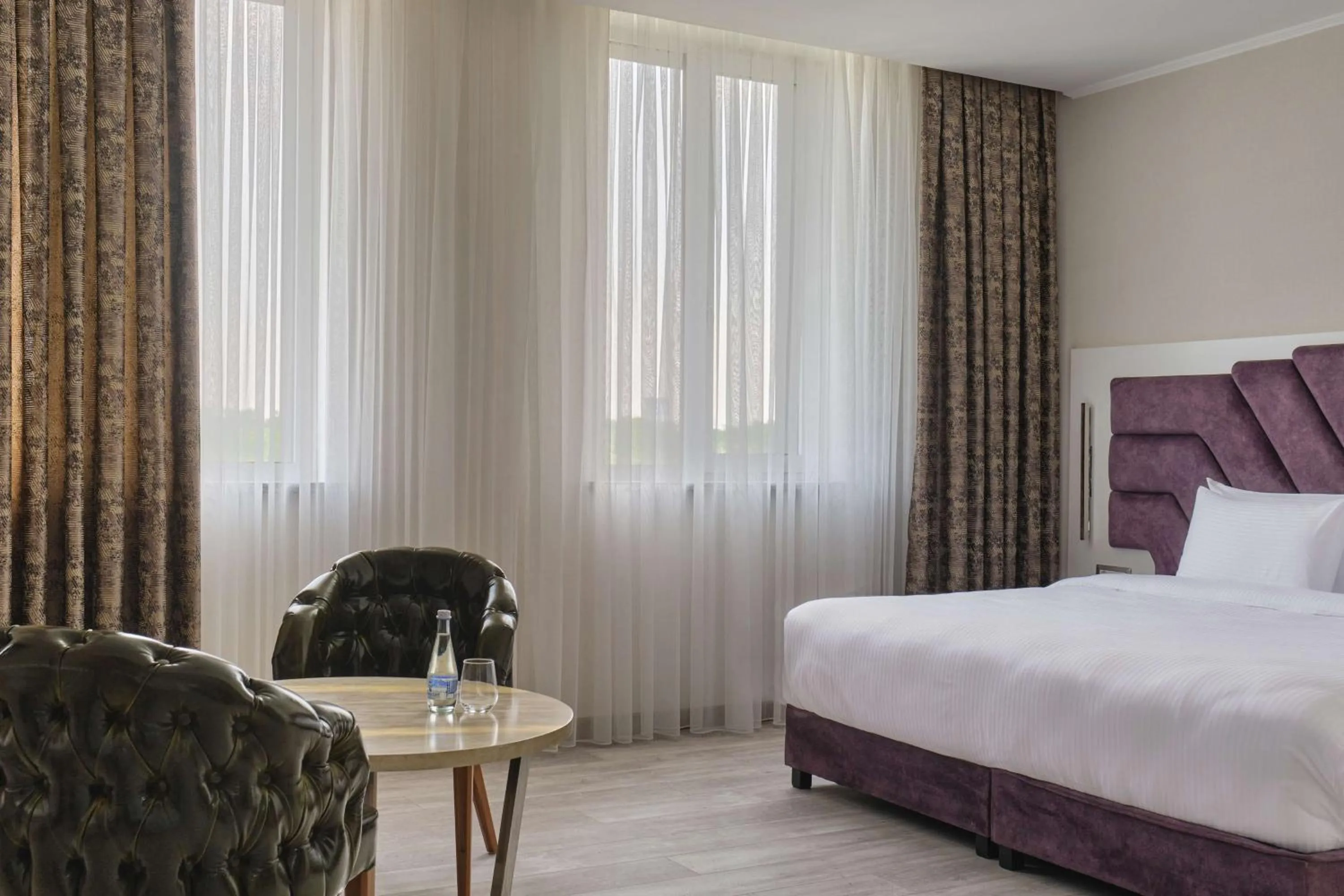 Bedroom, Bed in Panarams Tashkent Hotel, a member of Radisson Individuals