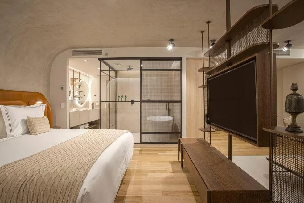 Bedroom, Bed in QOYA Hotel Curitiba, Curio Collection by Hilton