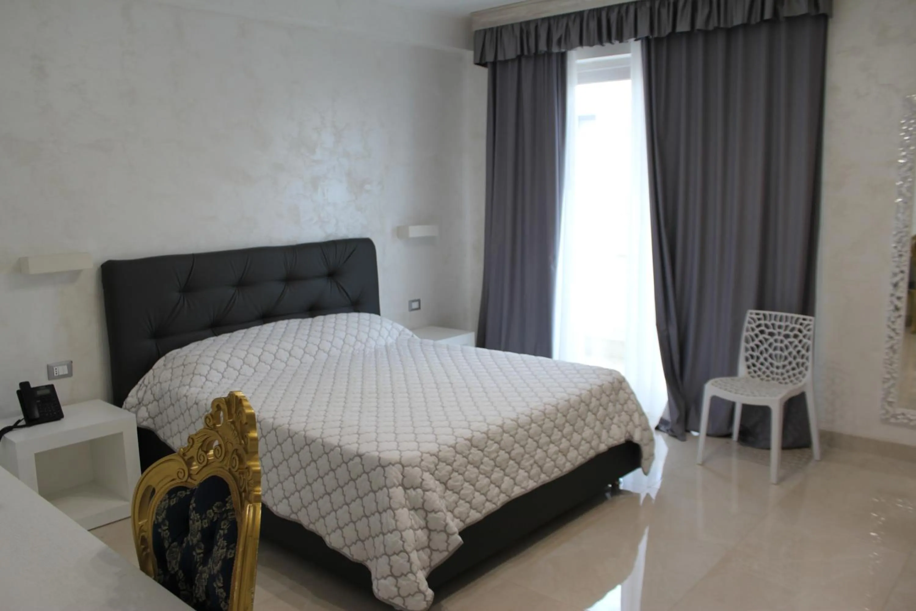 Bed in Hotel Presidente