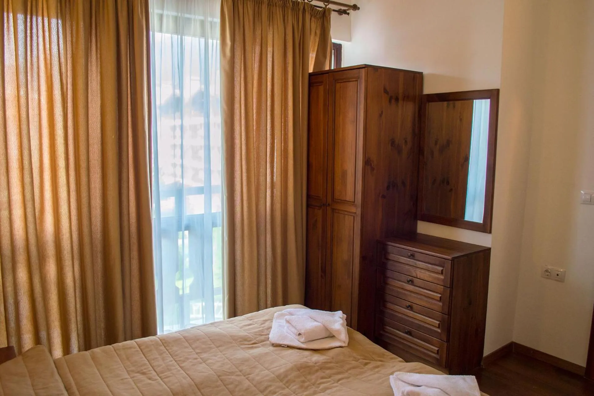 Bed in Winslow Infinity Aparthotel