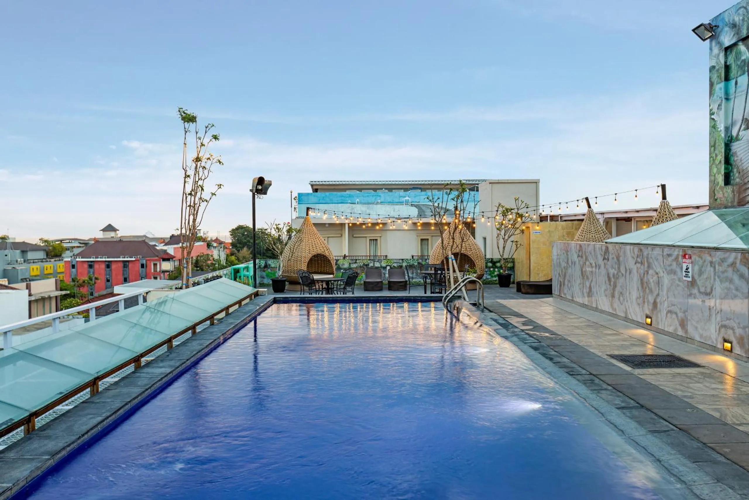 Swimming pool in Boss Legian Hotel Powered by Archipelago