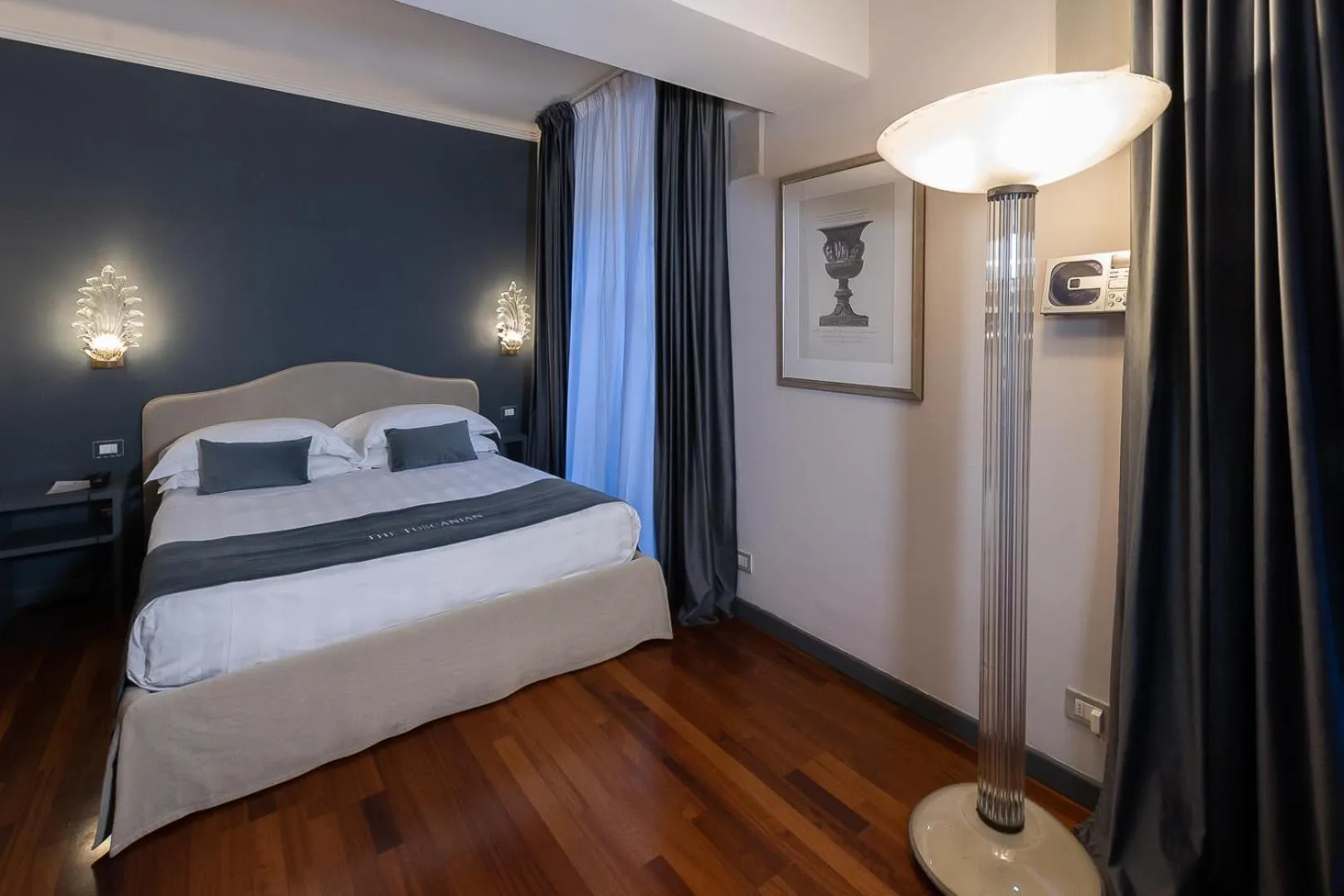 Bed in The Tuscanian Hotel