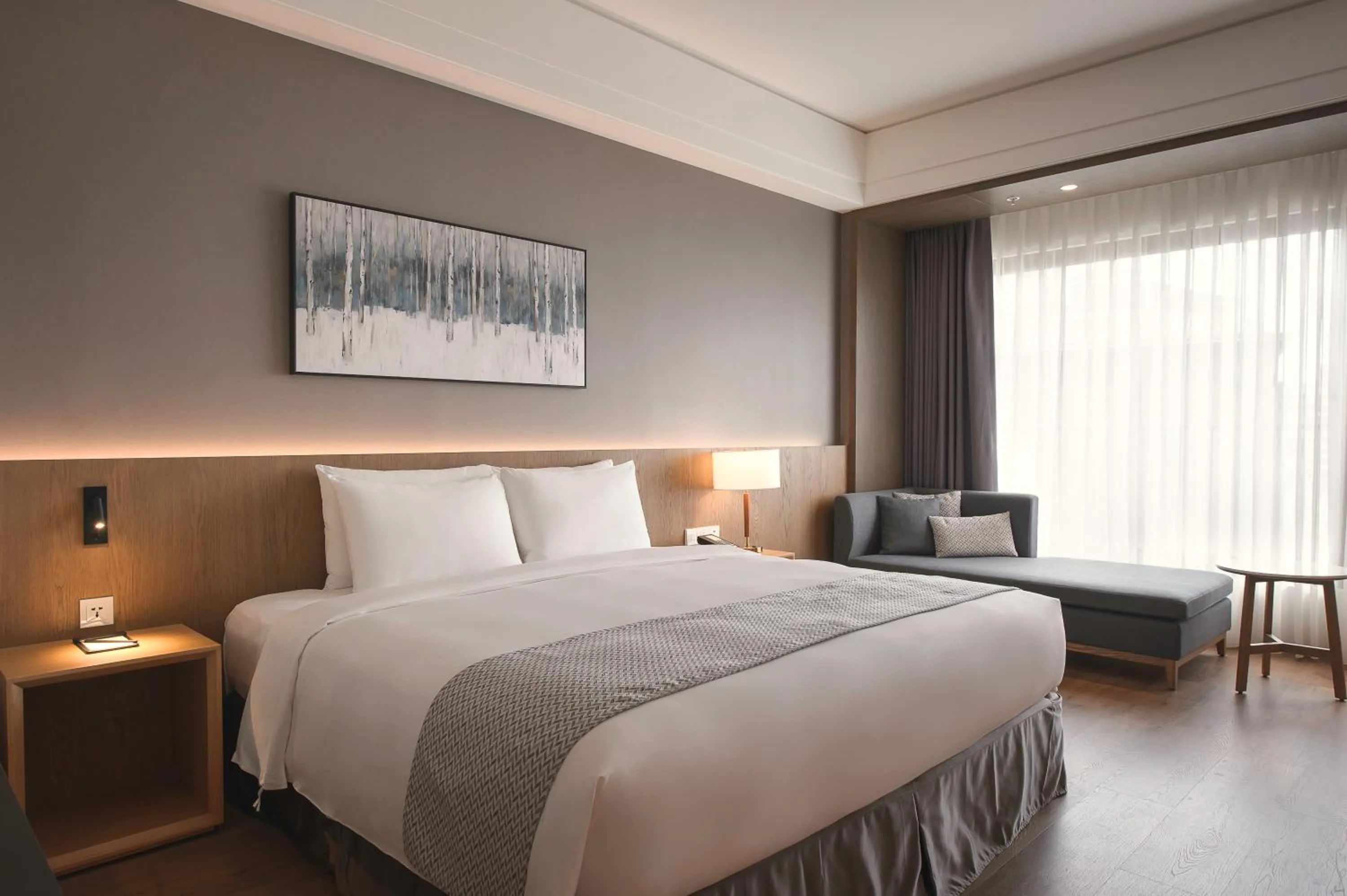 Bed in Grand Banyan Hotel