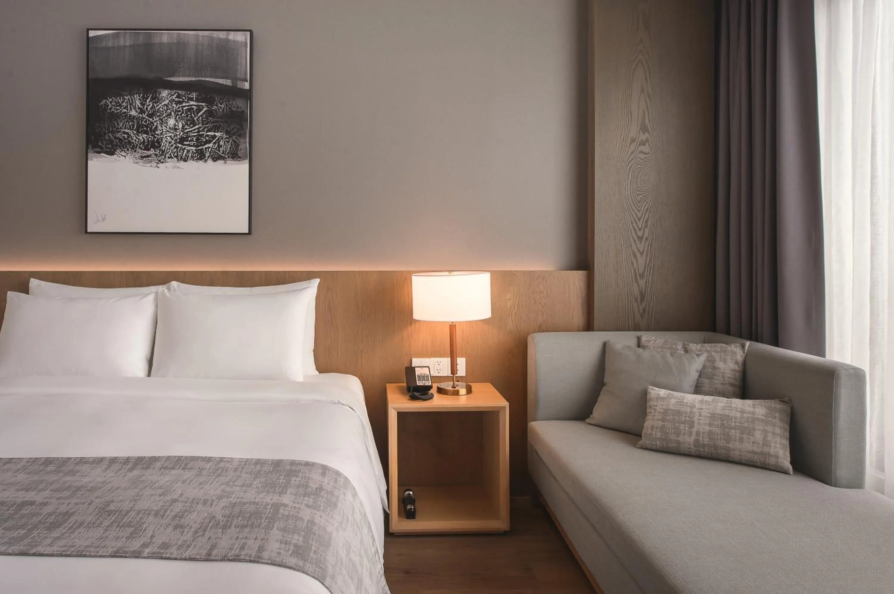 Bed in Grand Banyan Hotel