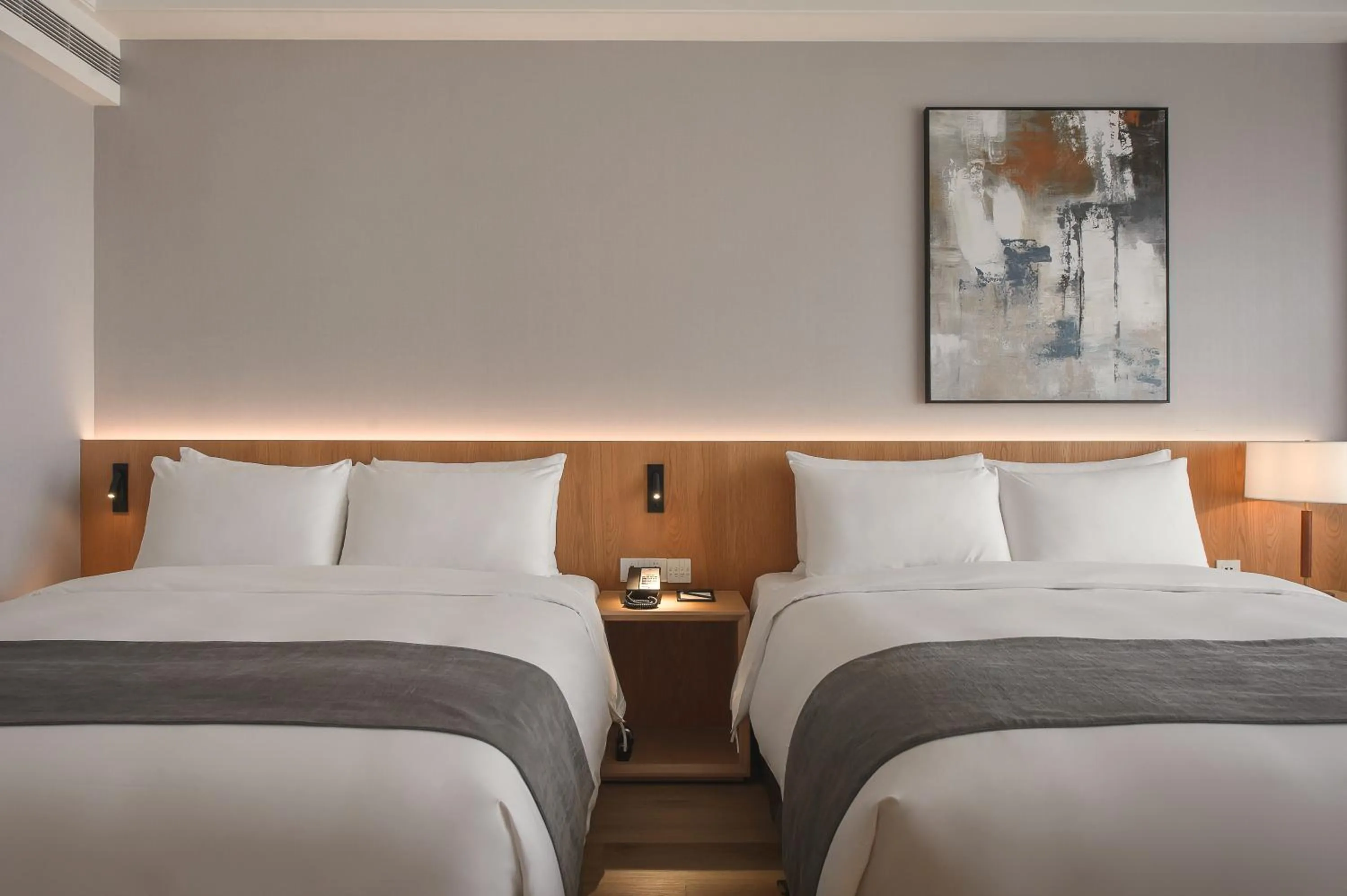 Bed in Grand Banyan Hotel