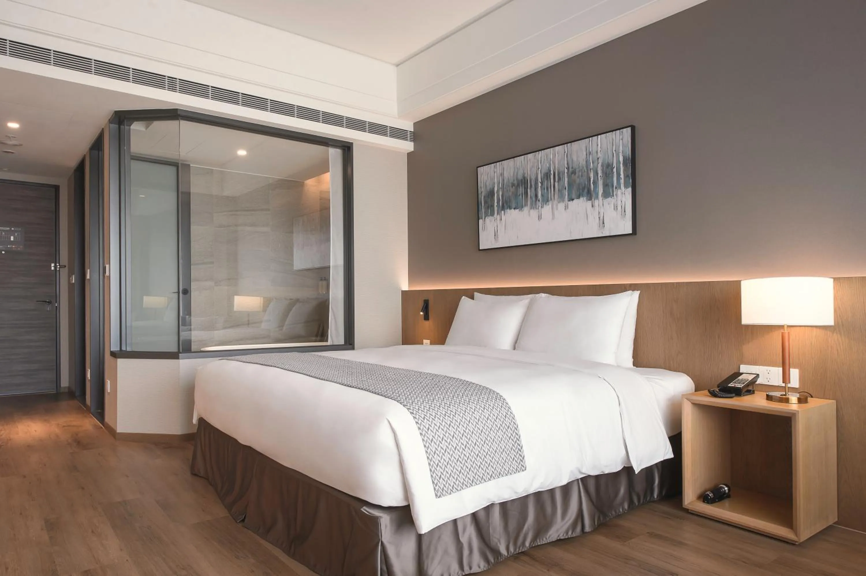 Bed in Grand Banyan Hotel