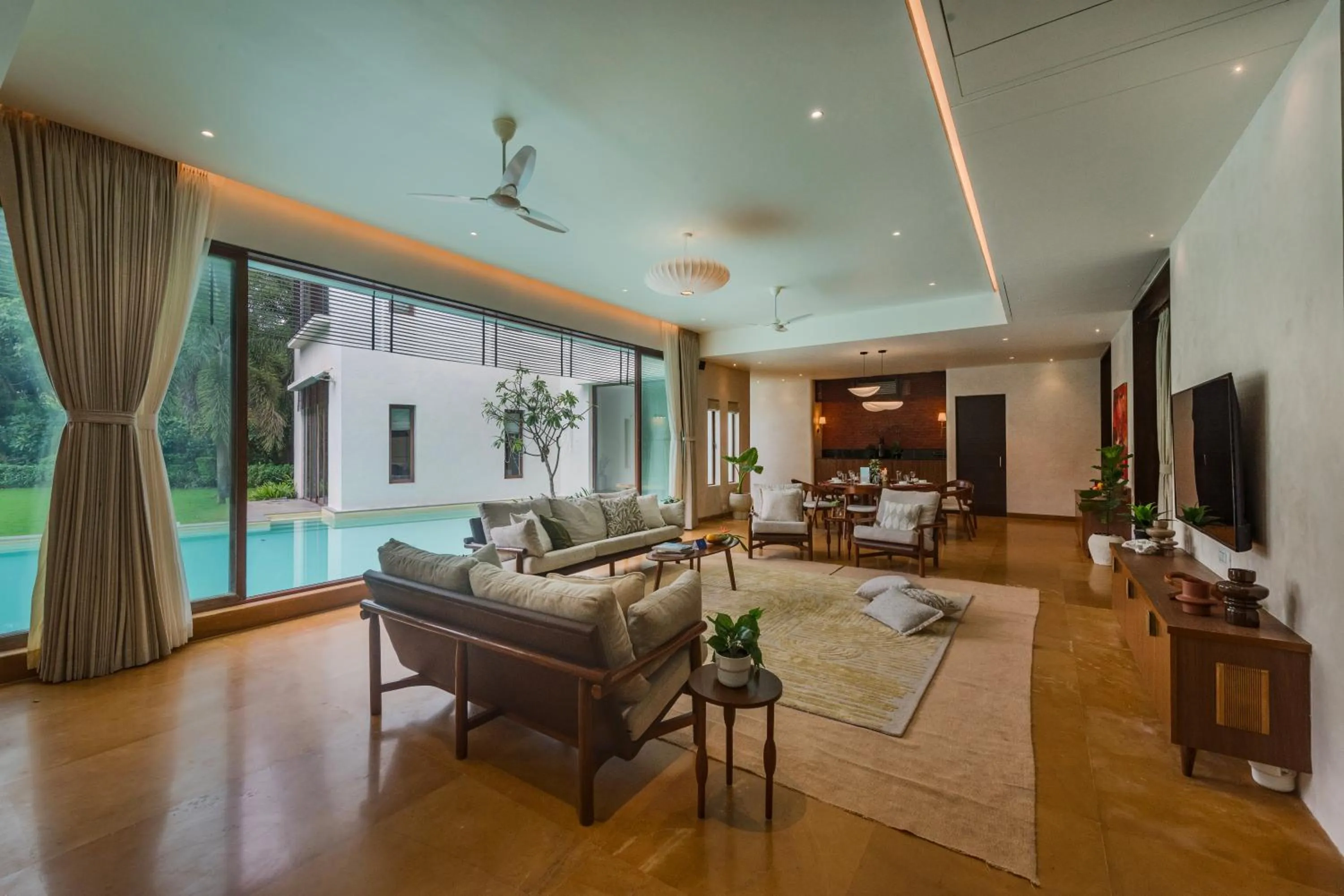 TV and multimedia in SaffronStays Estella, Alibaug