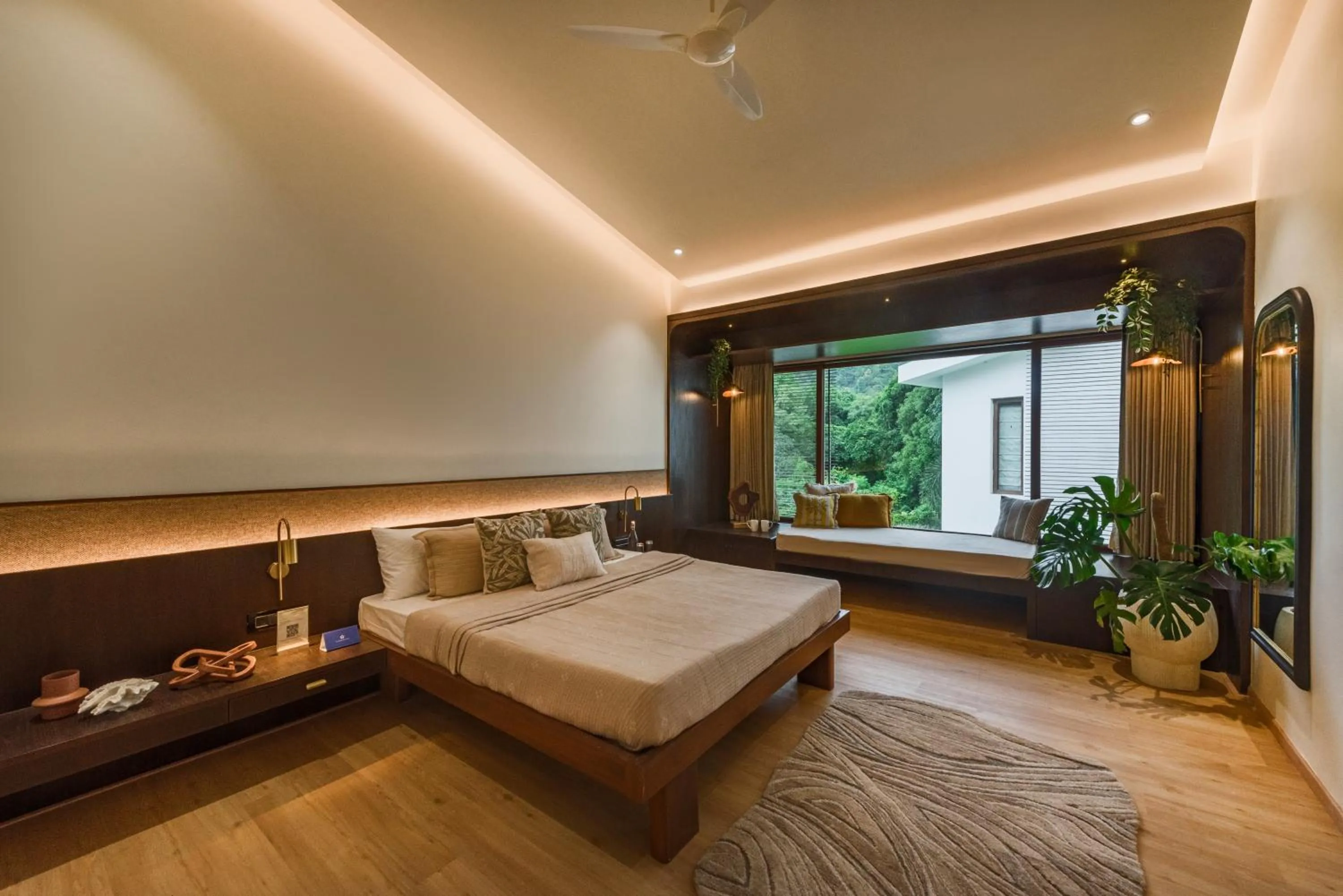 Bed in SaffronStays Estella, Alibaug