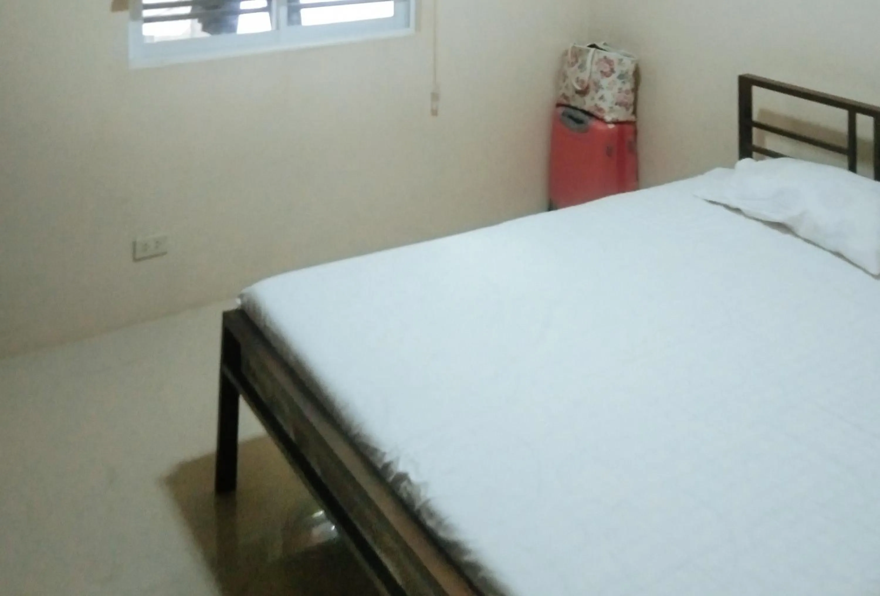 Bedroom, Bed in Skyleigh Apartelle by RedDoorz