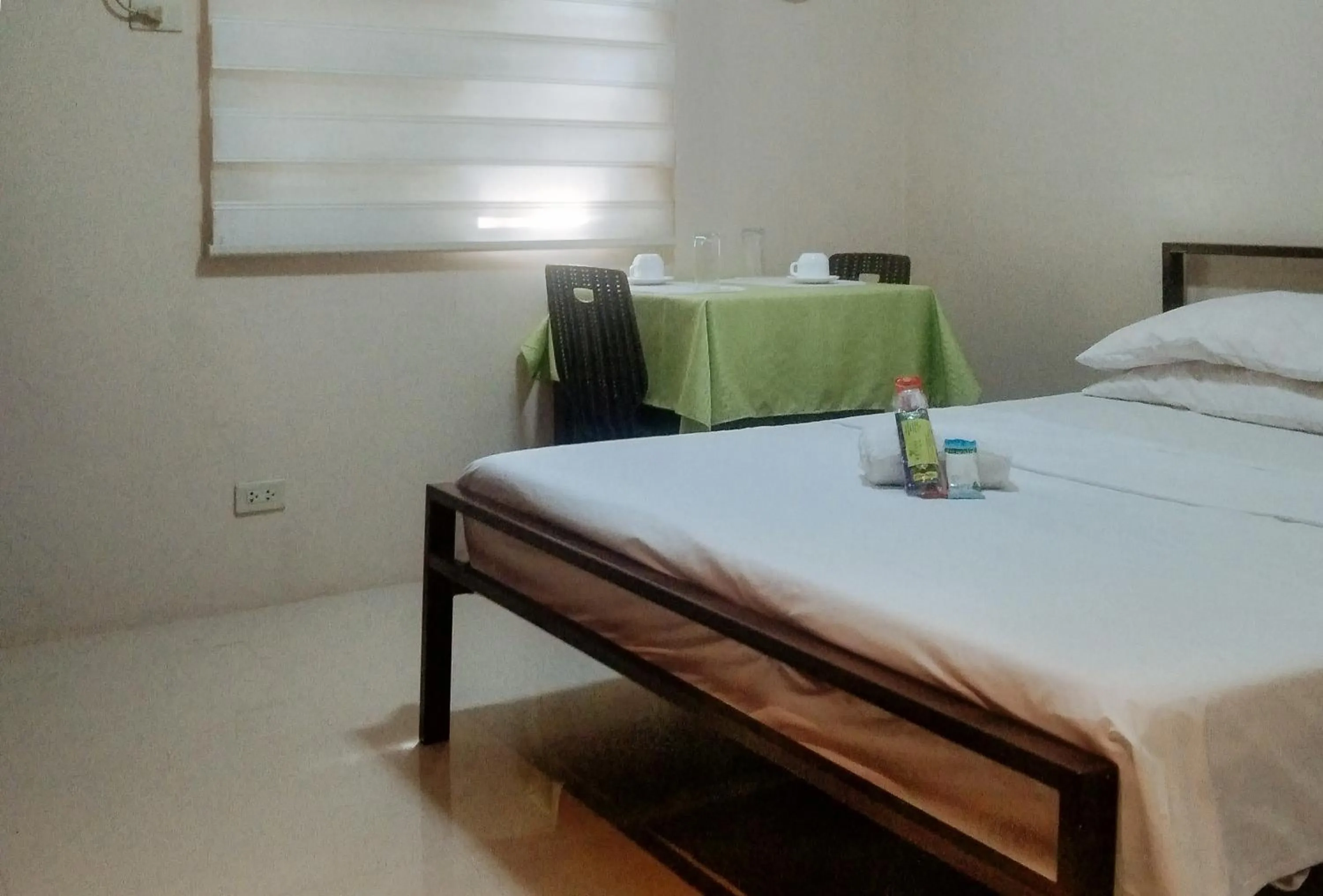 Bedroom, Bed in Skyleigh Apartelle by RedDoorz