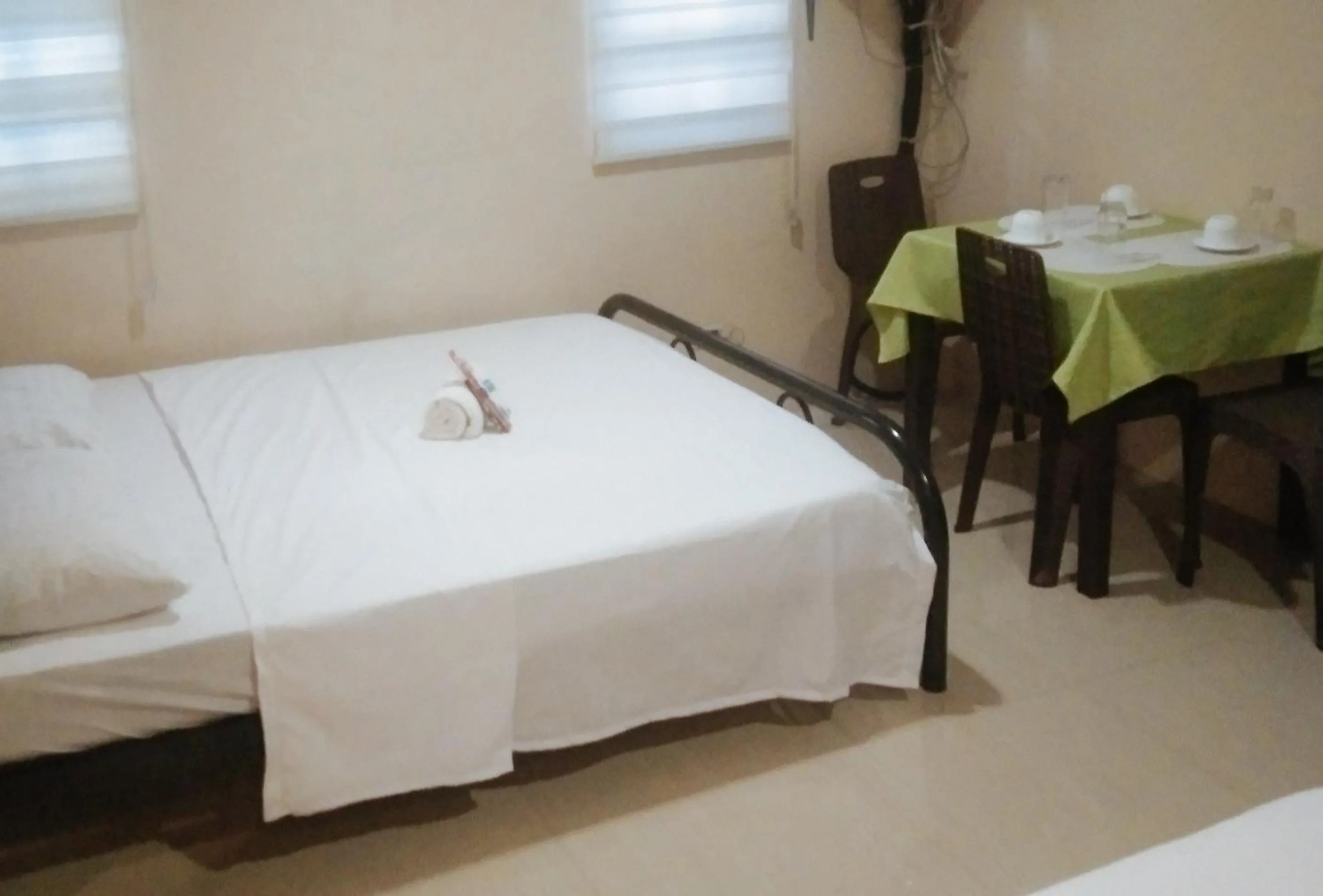 Bedroom, Bed in Skyleigh Apartelle by RedDoorz