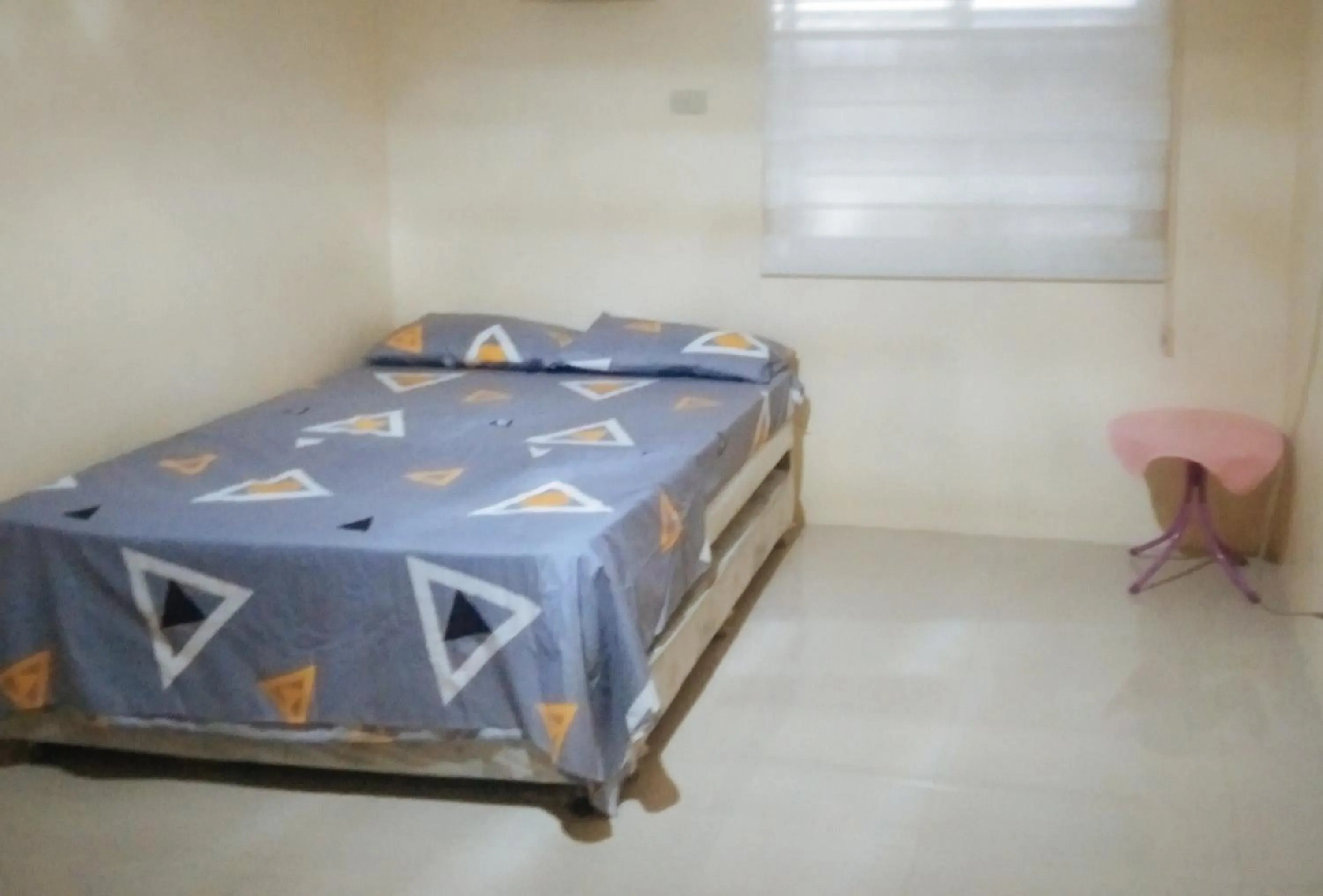 Bedroom, Bed in Skyleigh Apartelle by RedDoorz